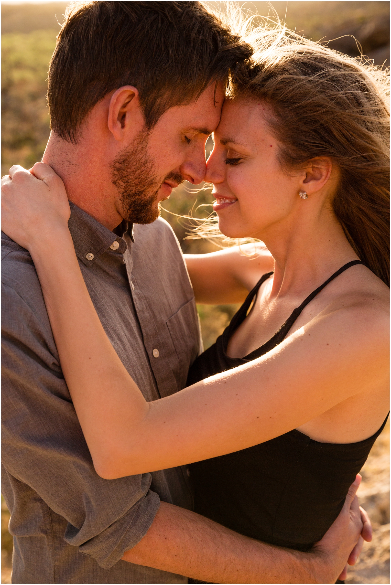 Golden hour is the perfect time for snuggles with the one you love! This couple was all cuddles during golden hour at their Arizona adventure session in Saguaro National Park. | Clarissa Wylde Photography