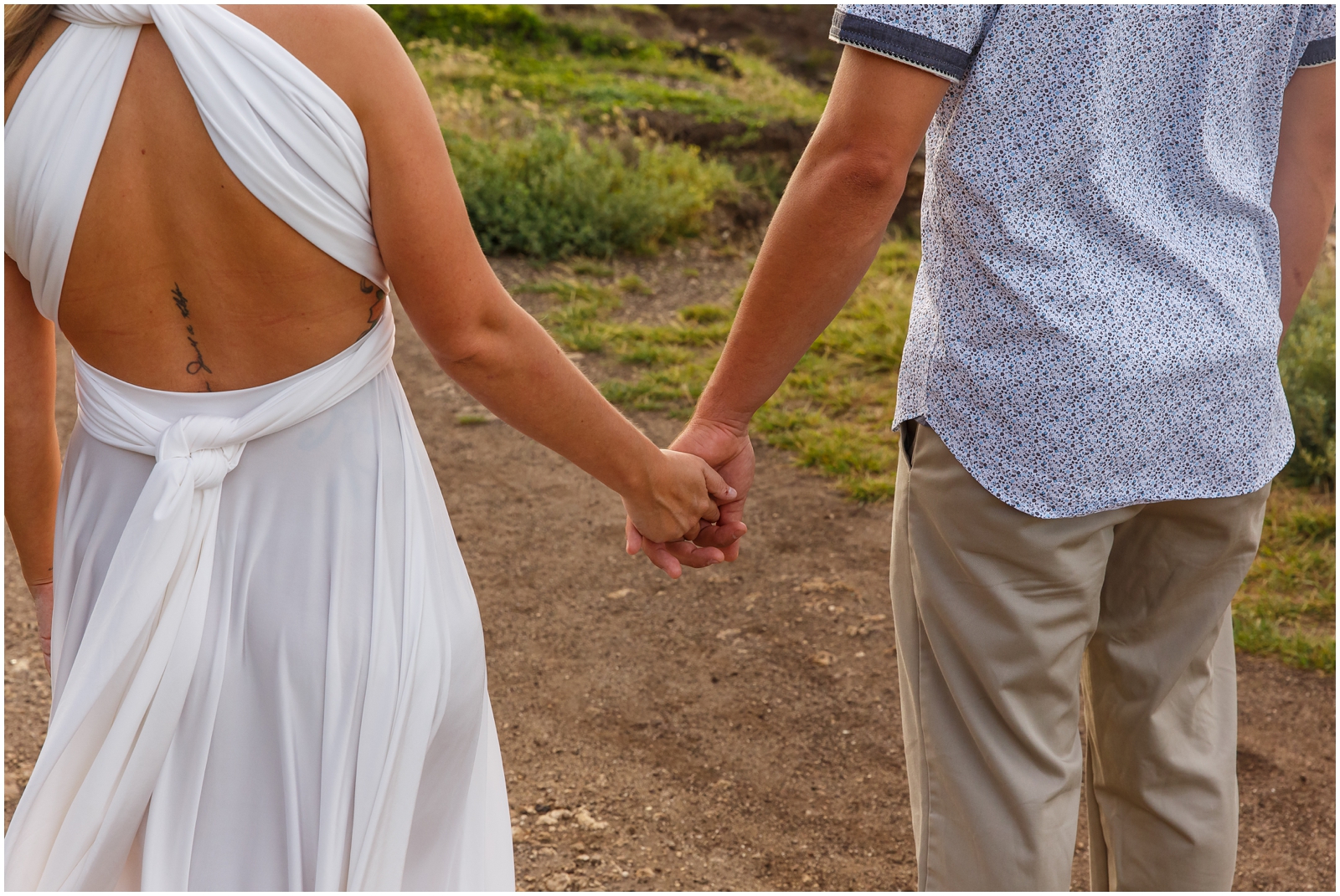 Bride and groom holding hands during their Hawaiian elopement.