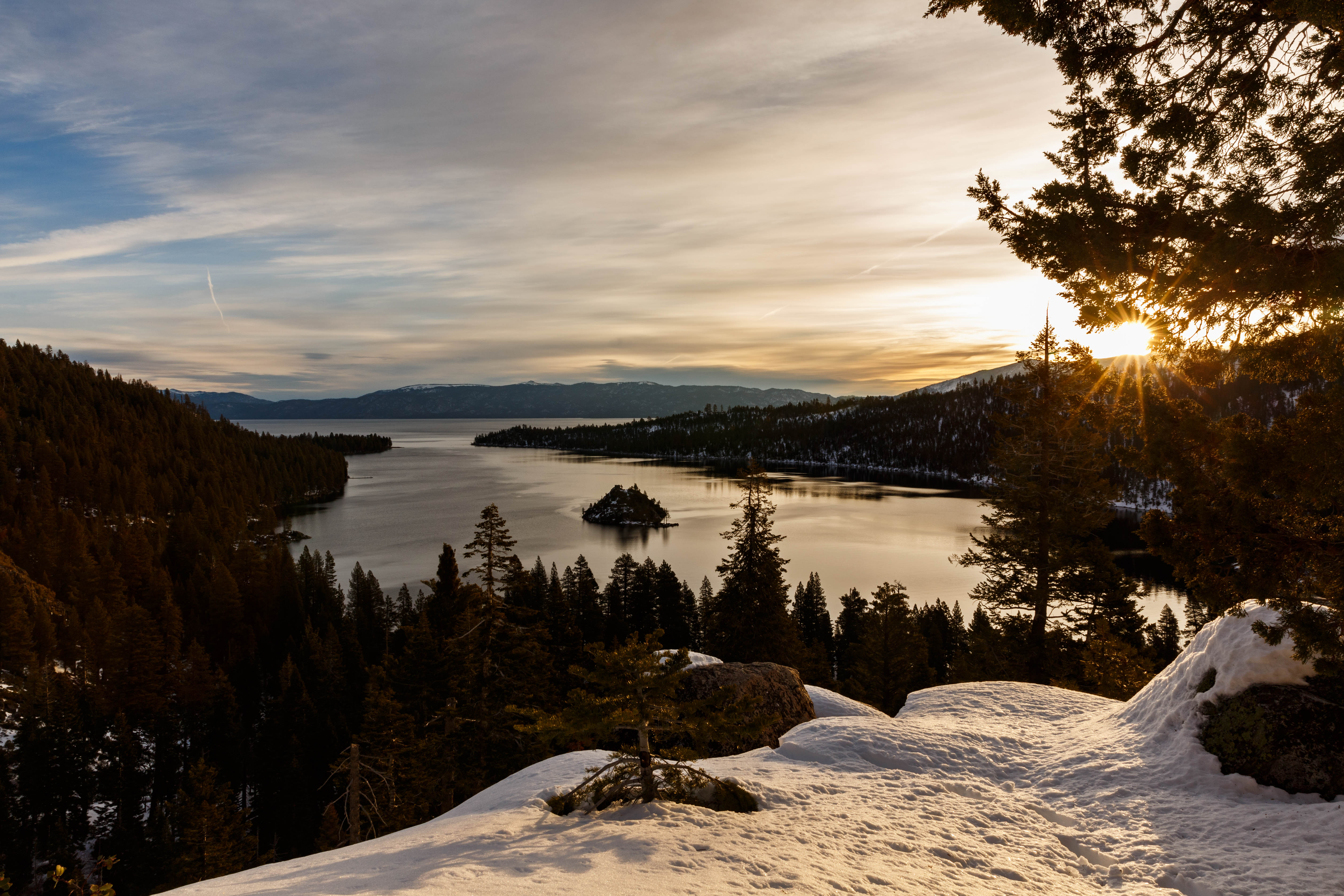 Snowy winter sunrise at Emerald Bay State Park, Lake Tahoe.