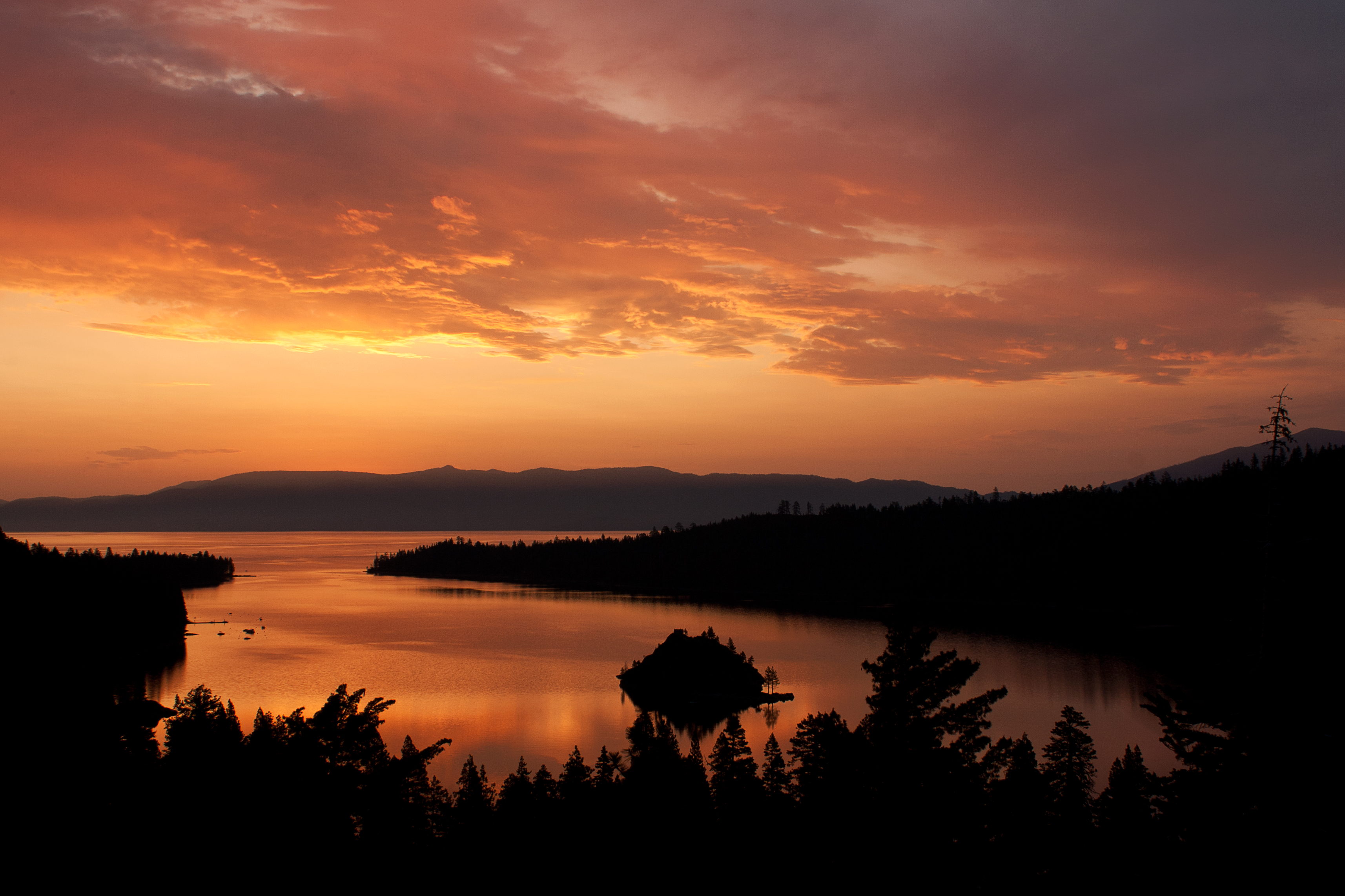 Pink and orange sunrise at Emerald Bay, Lake Tahoe. 