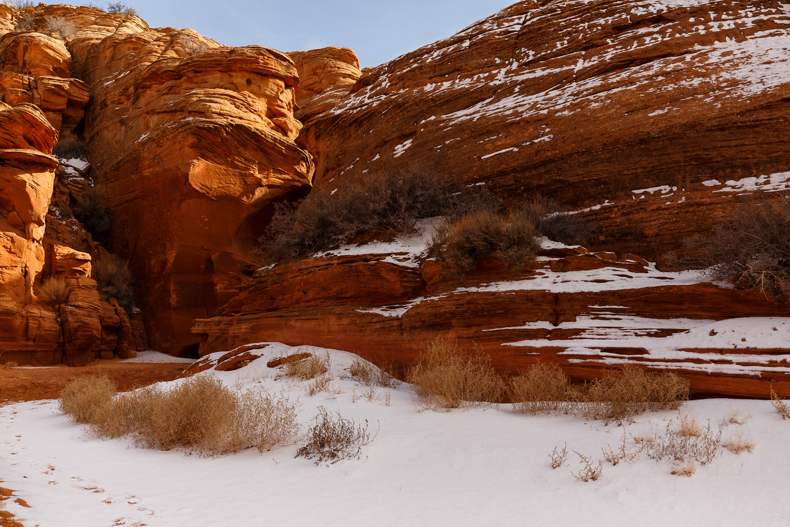 Waterholes canyon entrance covered in snow.
