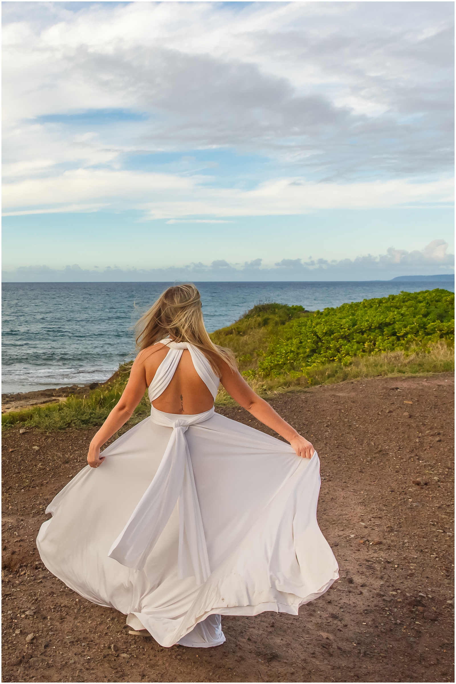 Bride twirling her gown during her Oahu elopement.