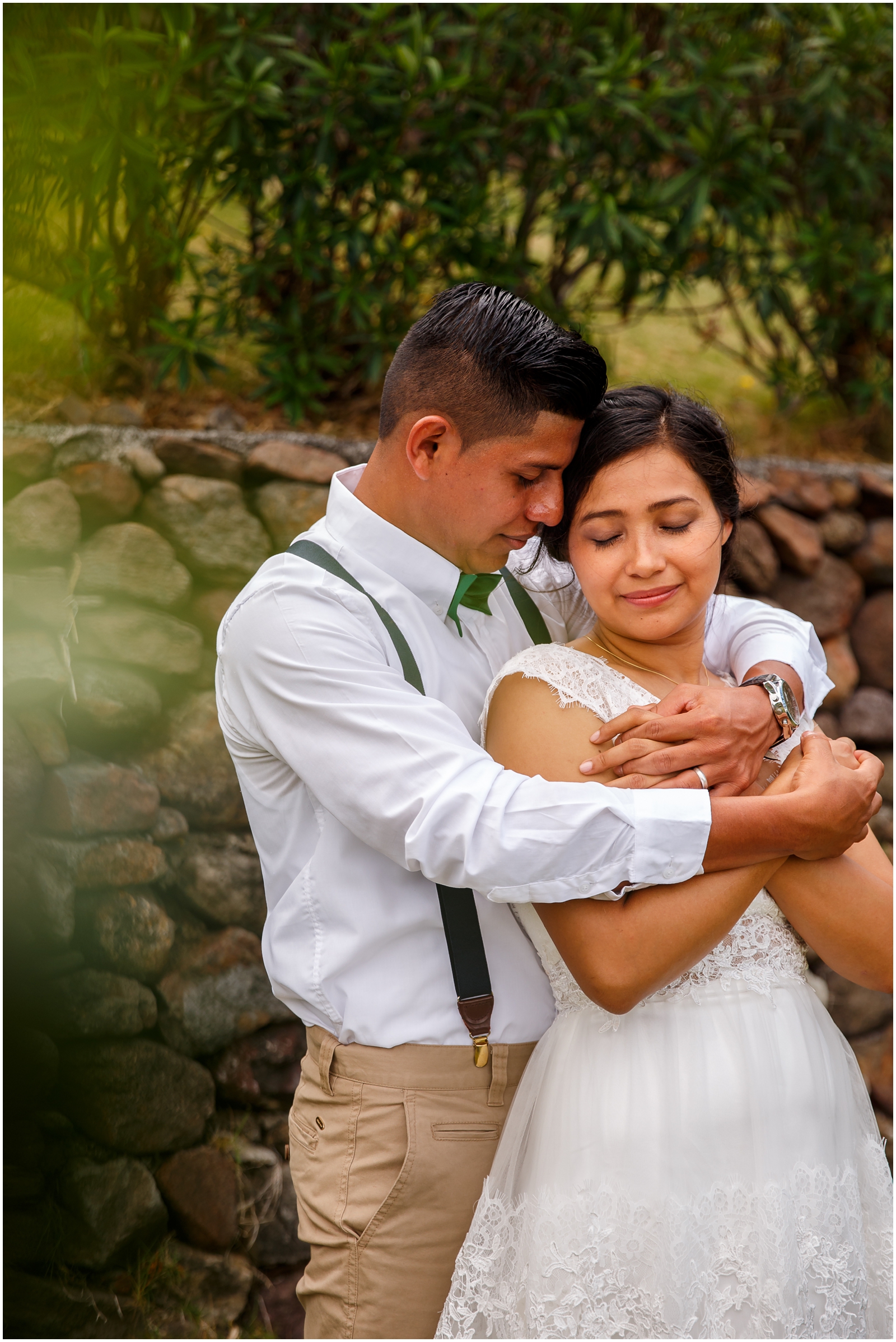A couple cuddling on their adventurous Nicaraguan wedding day.