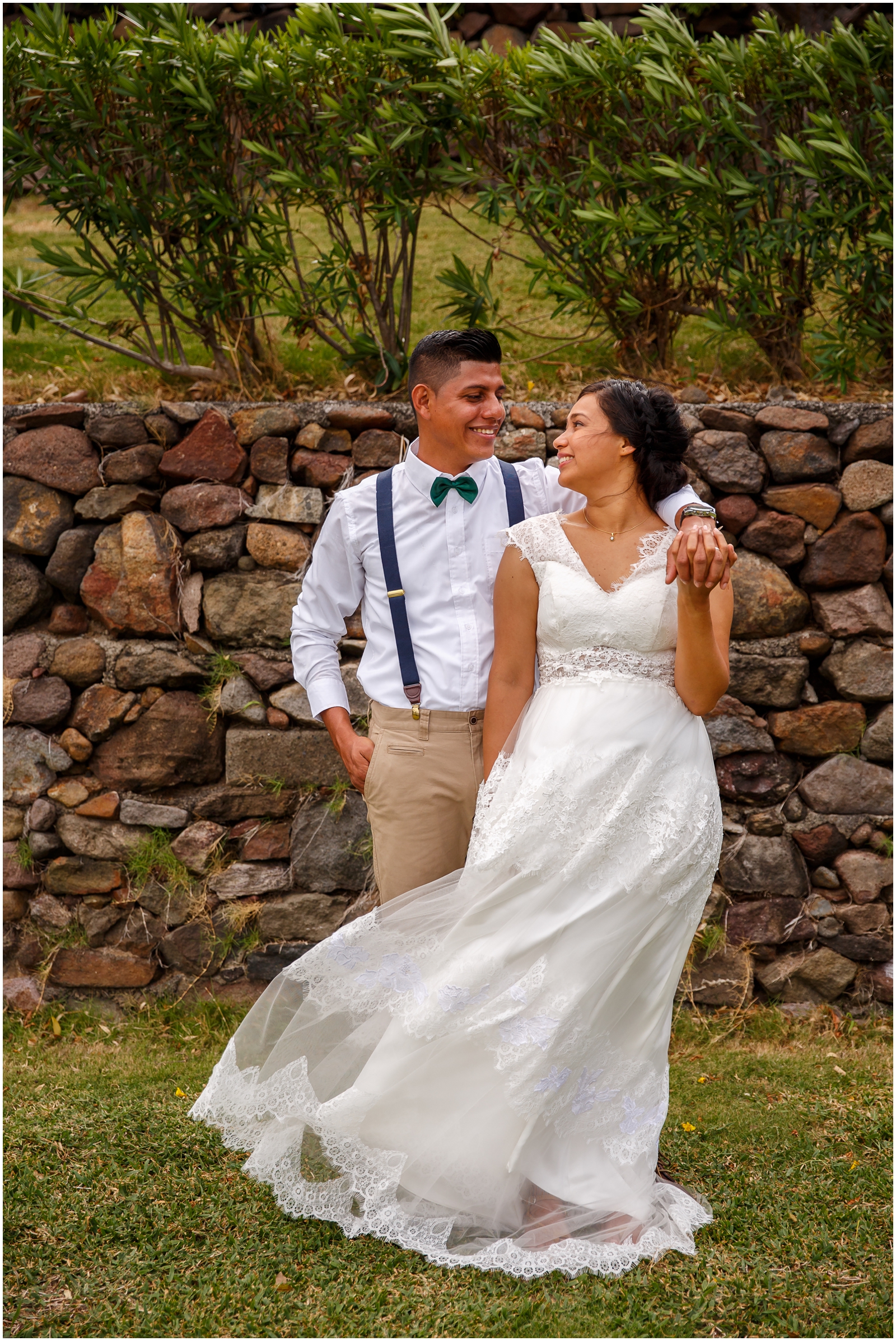 A bride and groom grinning on their wedding day in Nicaragua.
