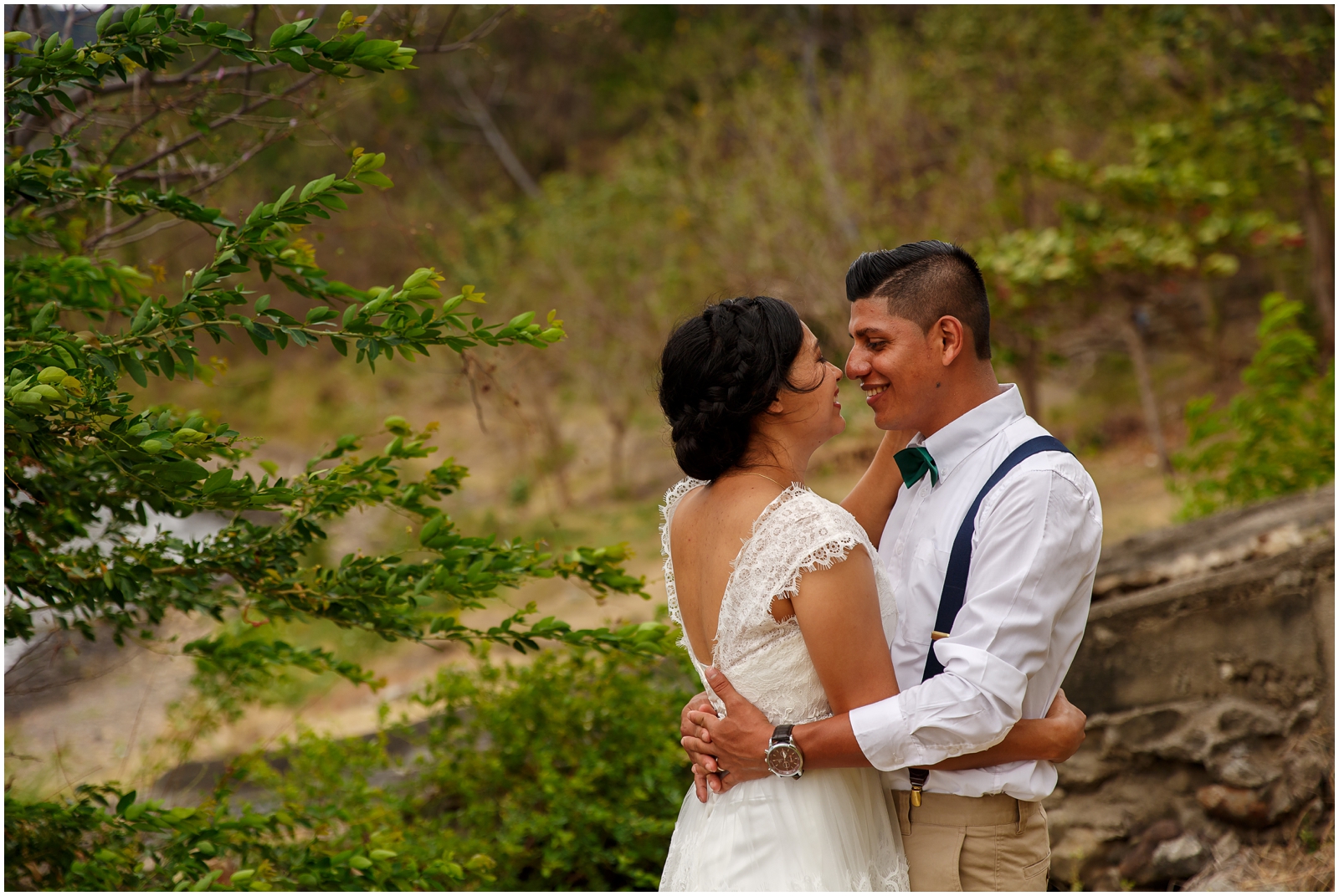 A bride and groom lakeside during their Nicaraguan intimate wedding.