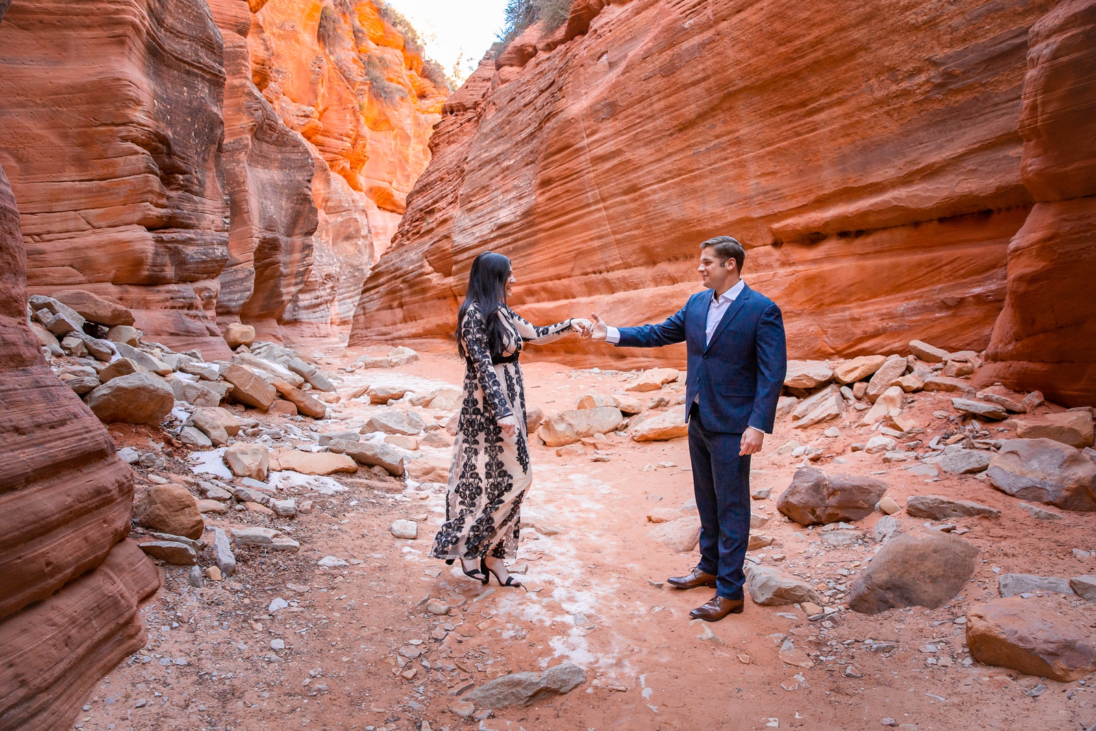 Engaged couple dancing in a Southern Utah Slot Canyon