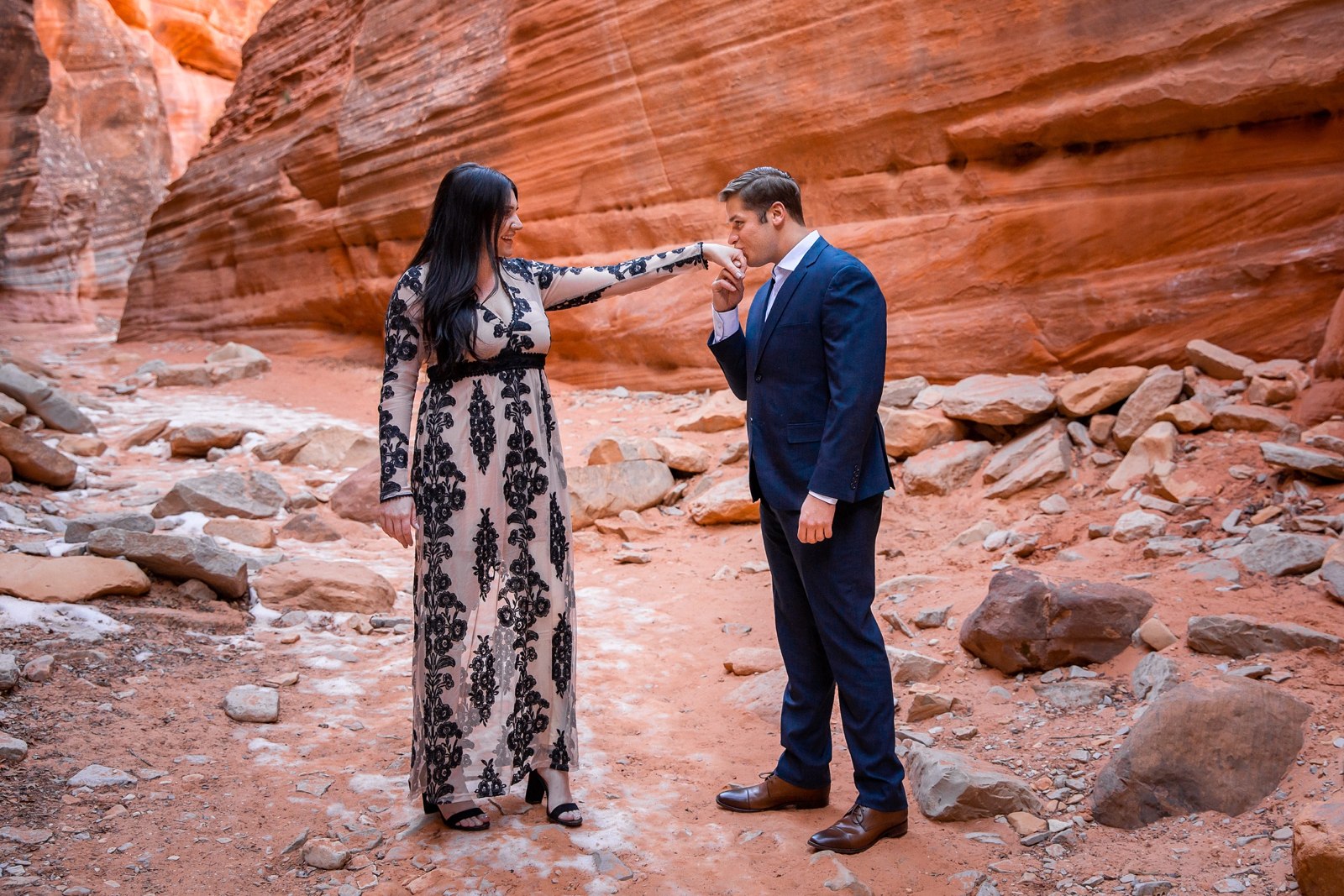 Elegant engaged couple in a Utah slot canyon