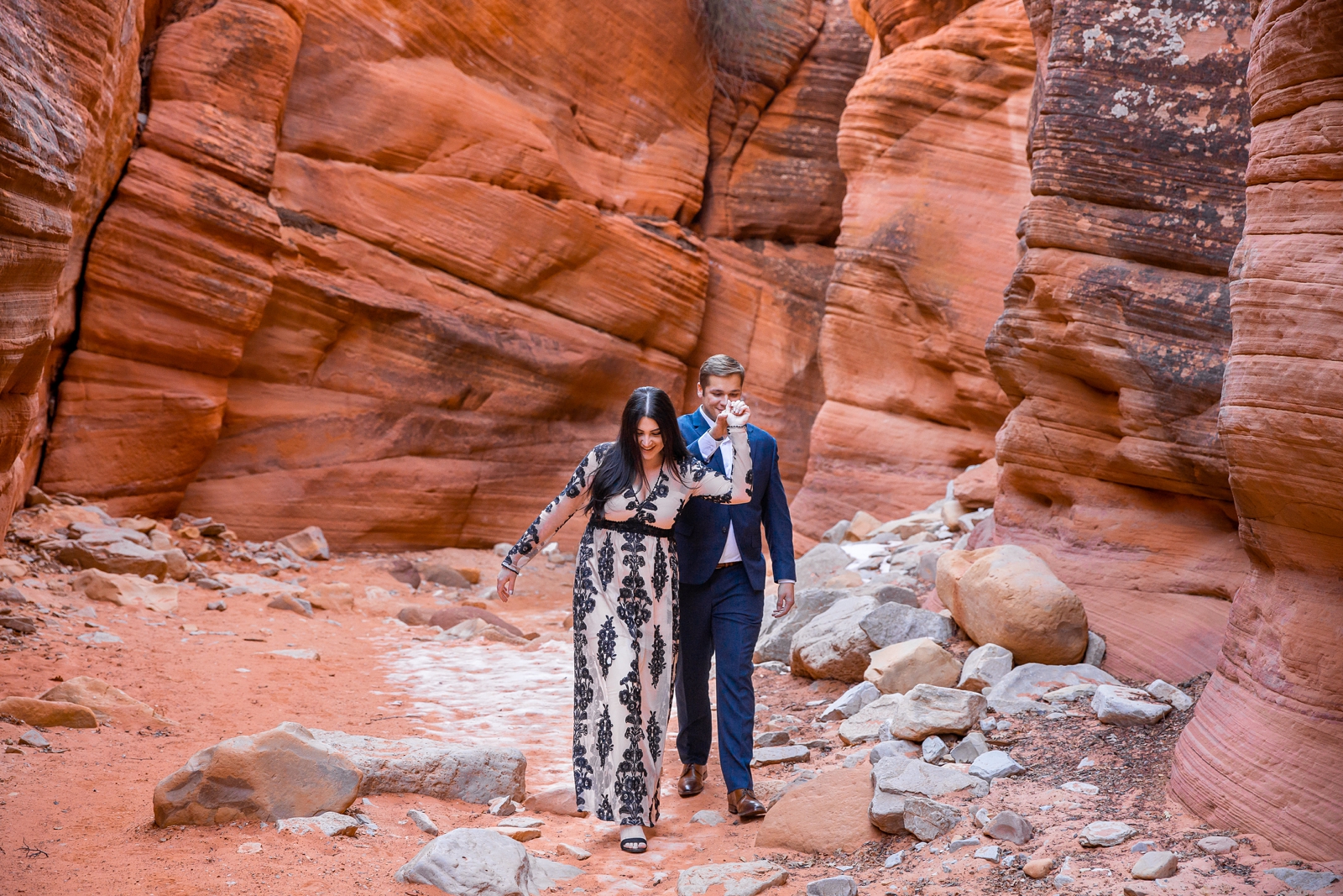 Hiking engagement session in a Utah slot canyon.