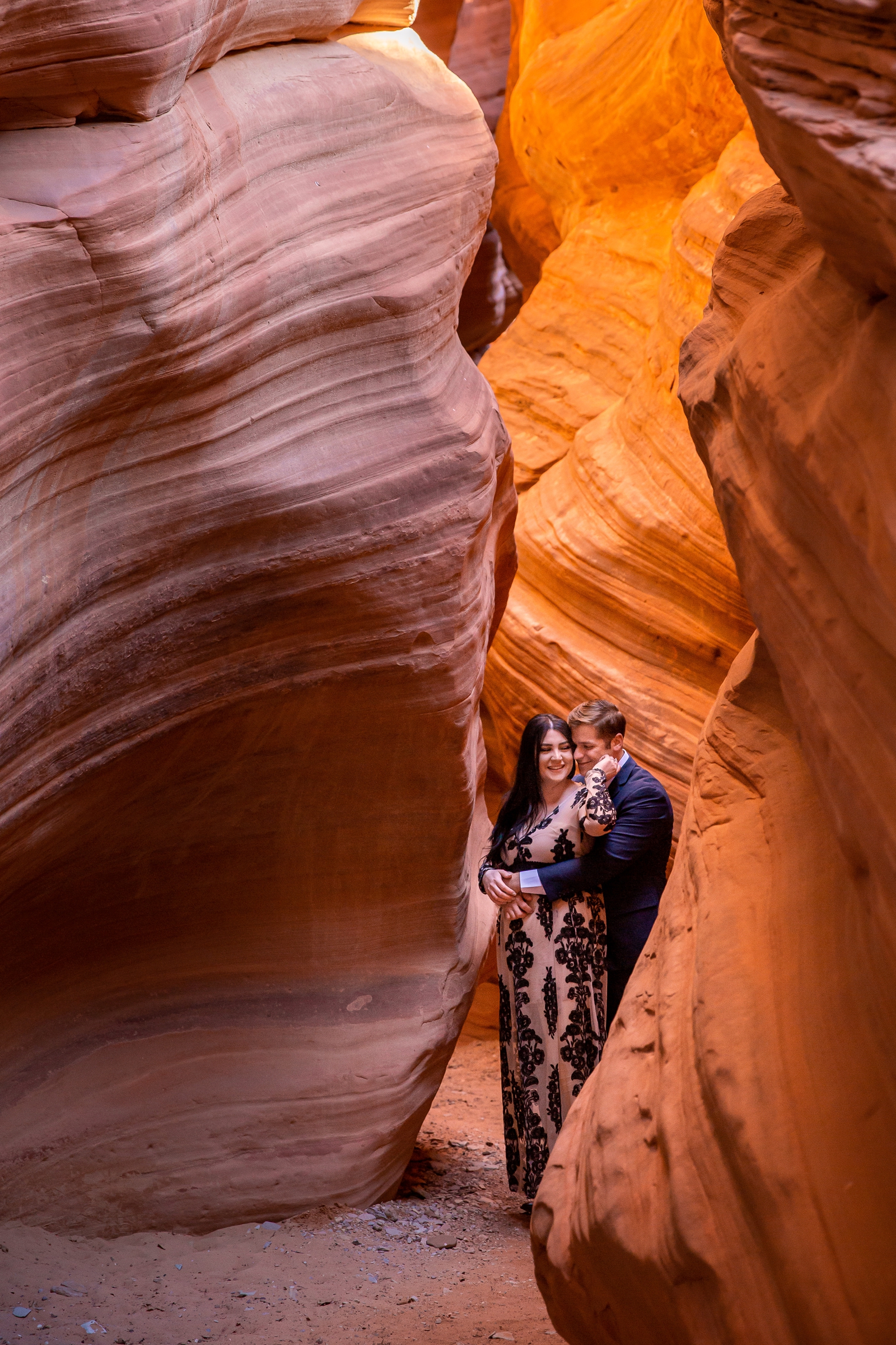 Romantic couple in a Utah slot canyon.