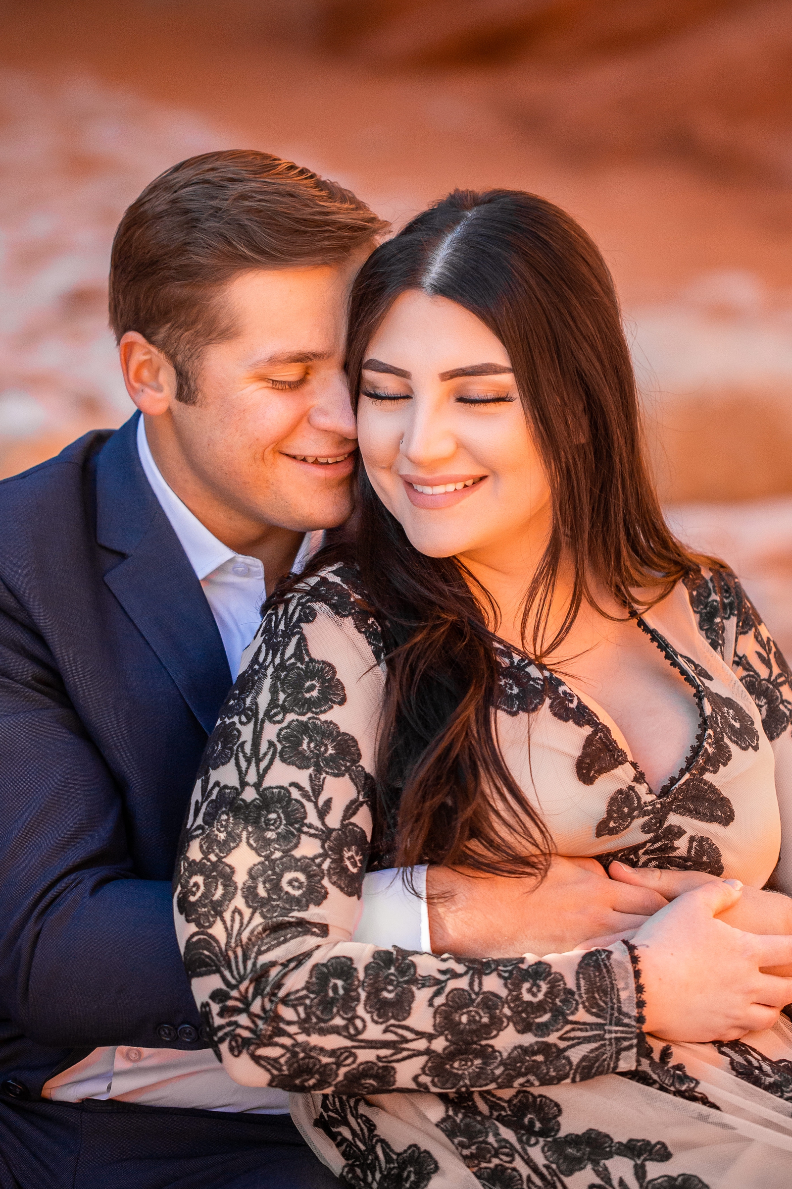 Couple in love at their Utah slot canyon engagement session.