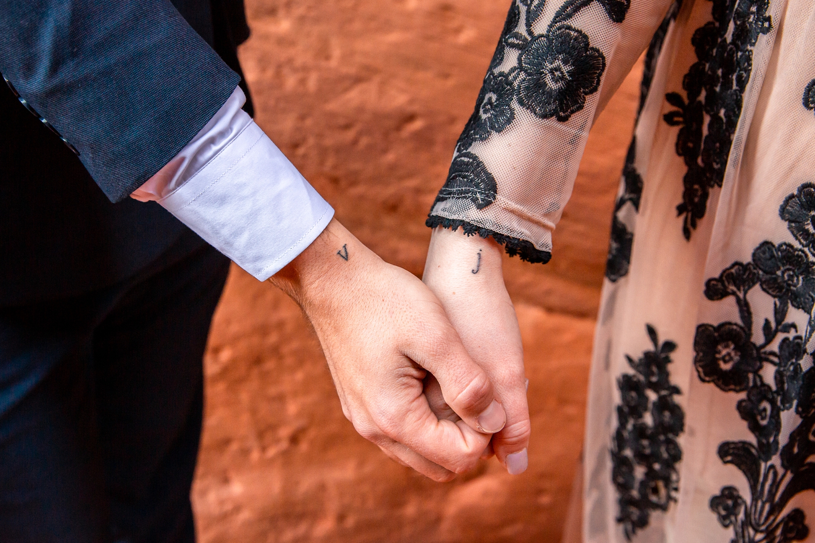 Matching tattoos at this Utah slot canyon elopement.