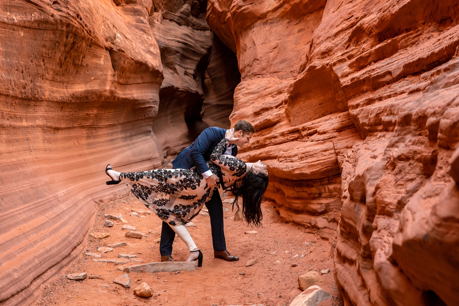Super fun engaged couple in a Utah slot canyon.