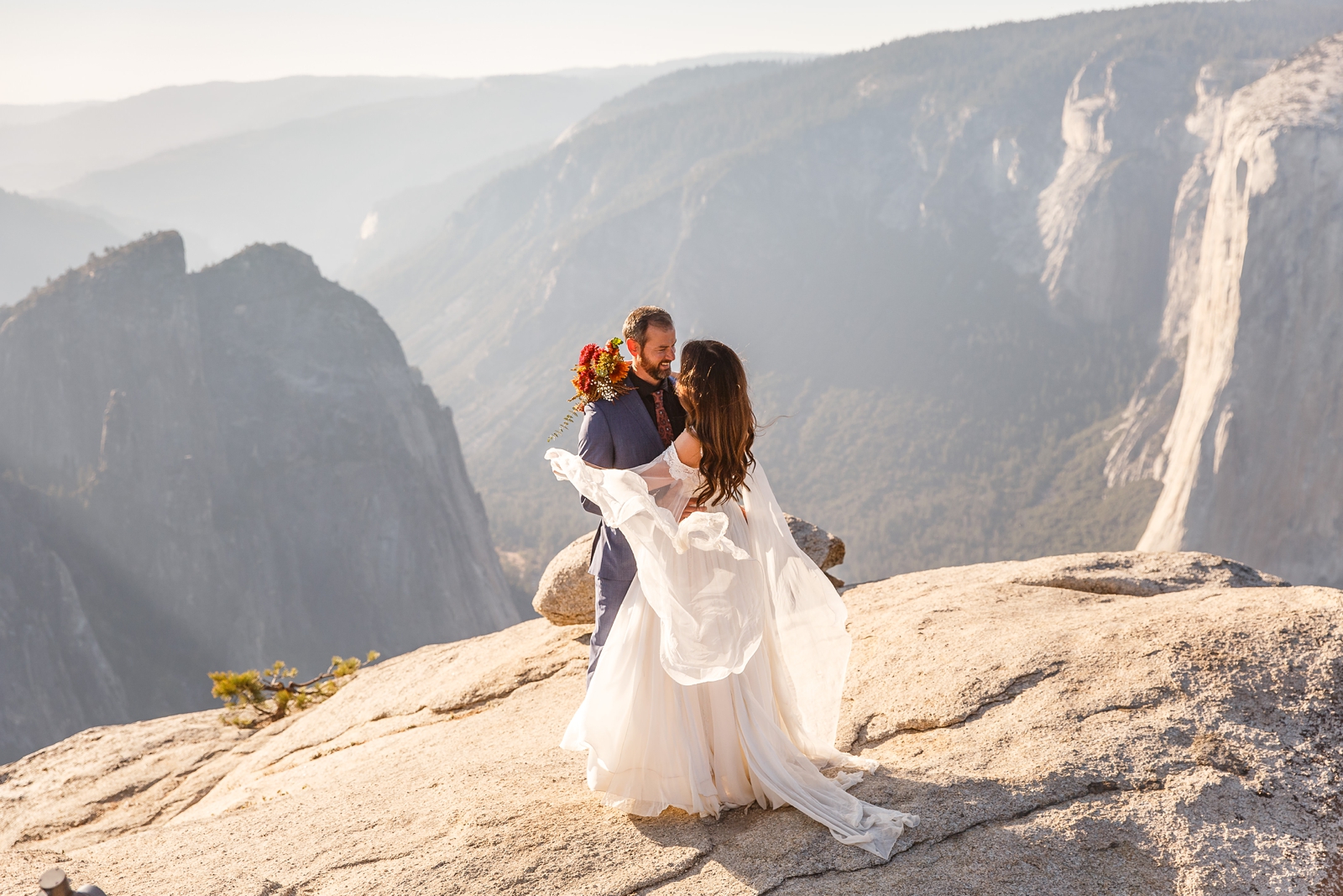 Magical windy elopement at Taft Point Yosemite.
