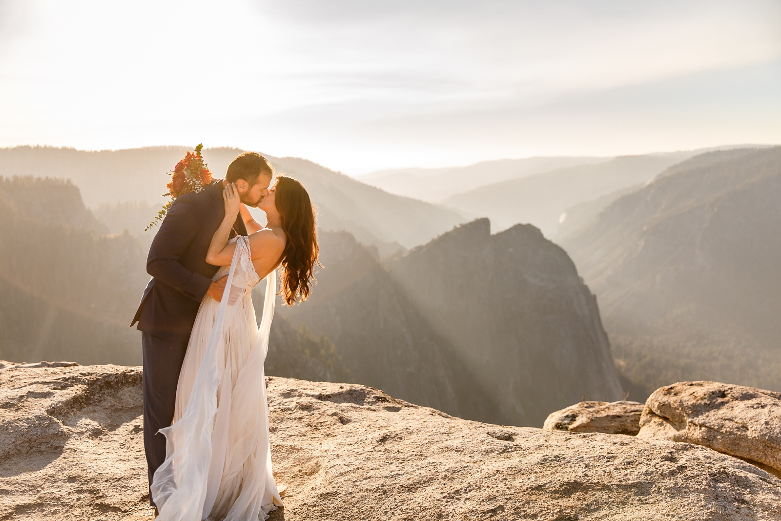 Magical kiss at this couples epic Yosemite elopement.