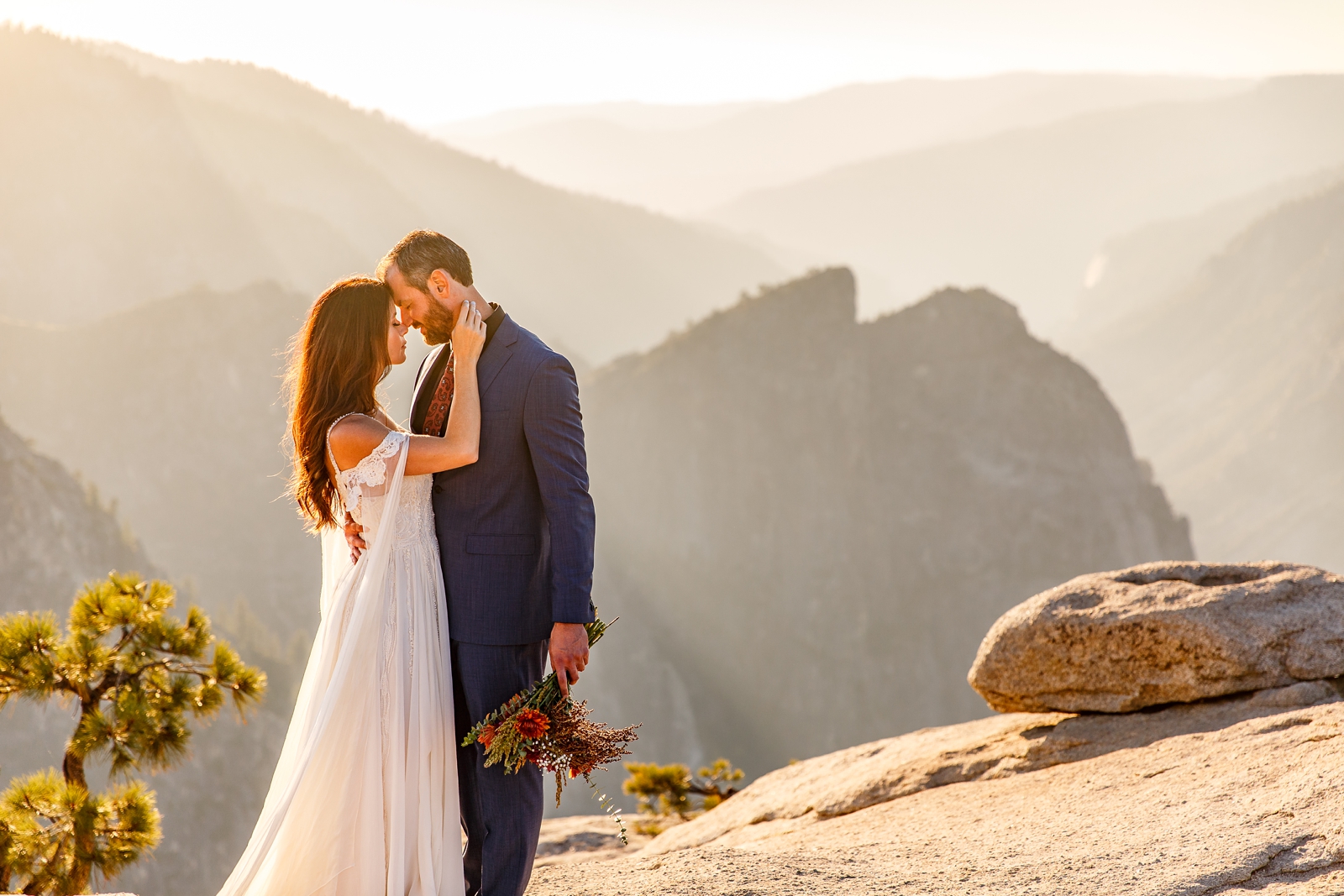This couple eloped during golden hour at Taft Point in Yosemite!