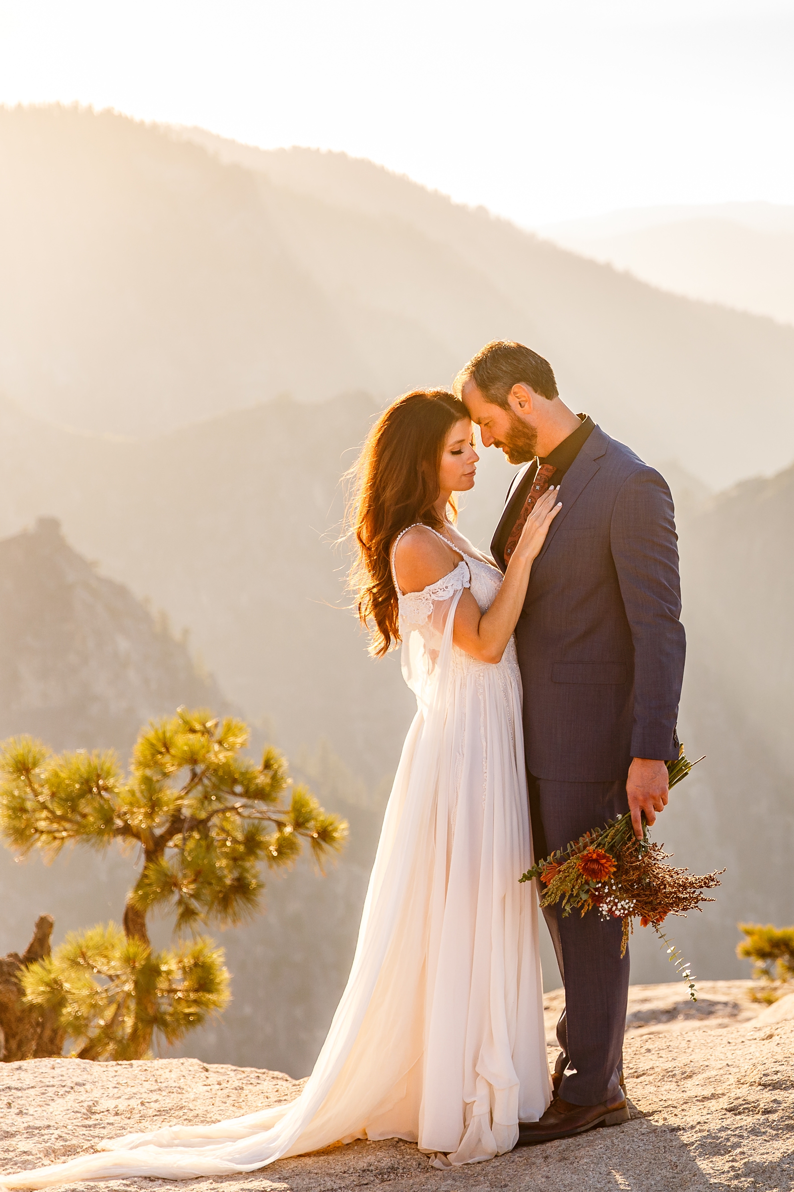 Romantic couple at their Taft Point Yosemite elopement.