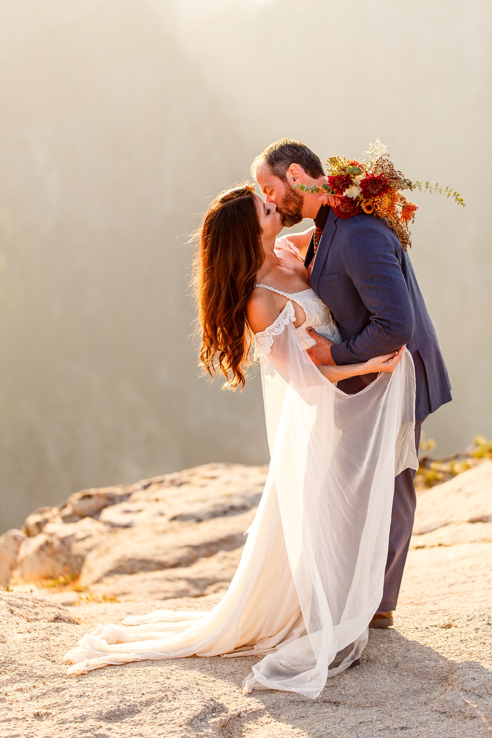 Epic kiss at this couple's golden hour Taft Point elopement.