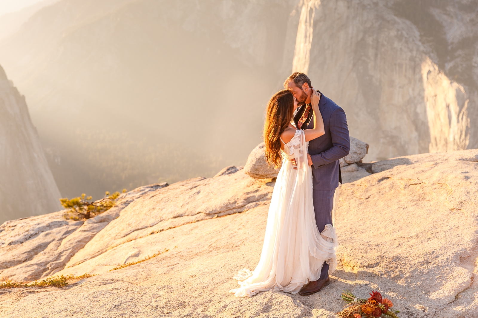 Epic kiss at this couple's adventurous Taft Point elopement.