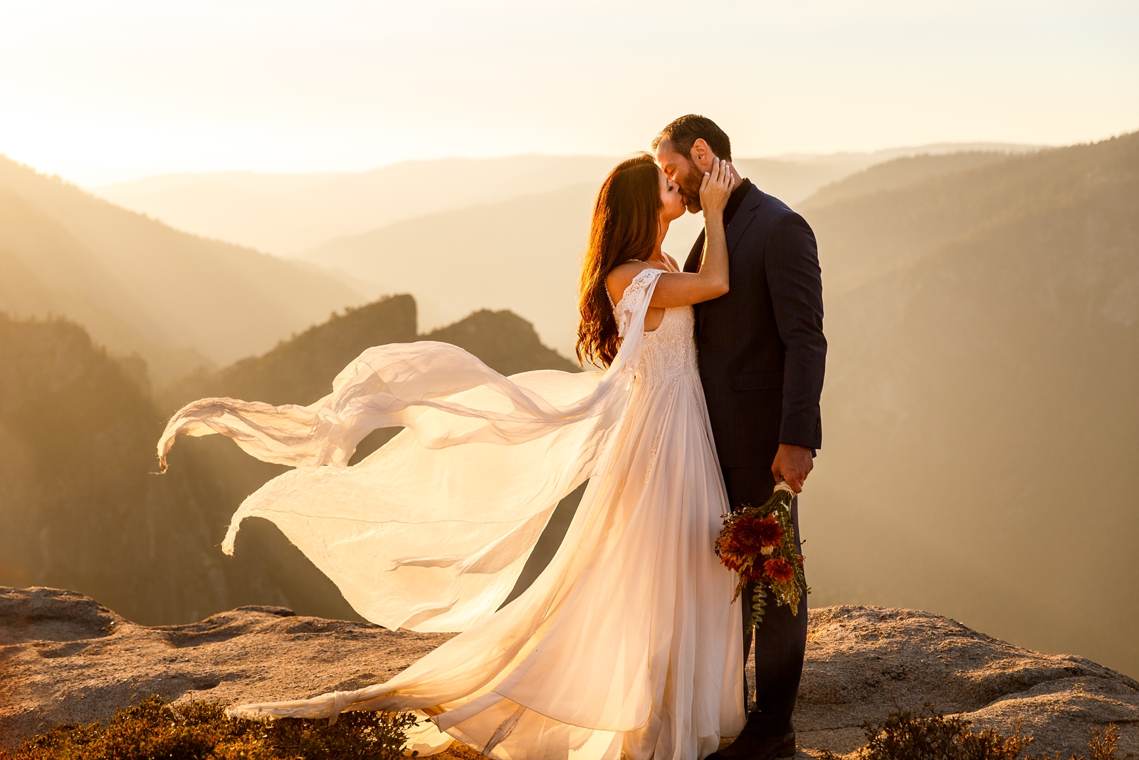 Wind blowing the wedding dress perfectly at this couple's Yosemite elopement.