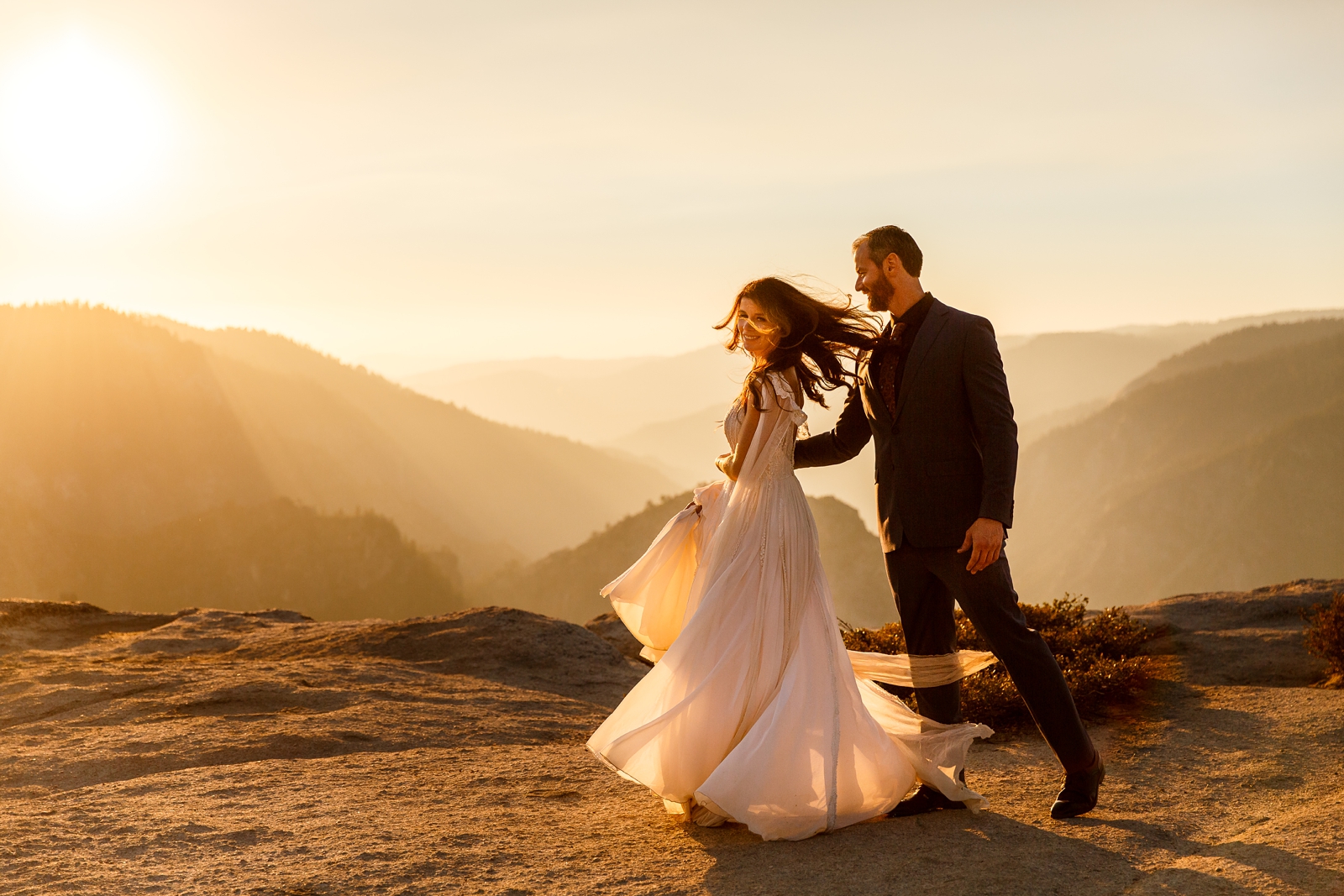 Wedding dress spin at this couple's Yosemite sunset elopement.