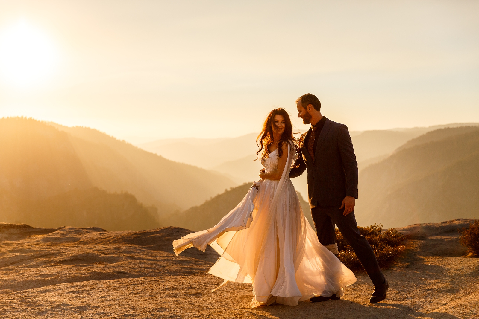Bride and groom dancing at sunset during their Yosemite elopement.