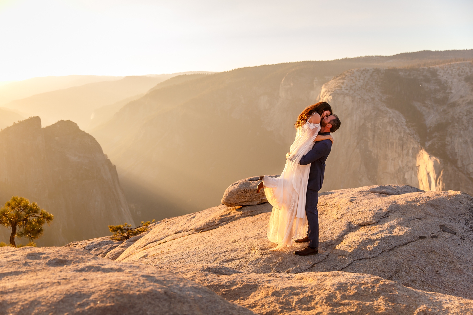 Epic kiss at this couple's Yosemite sunset elopement.