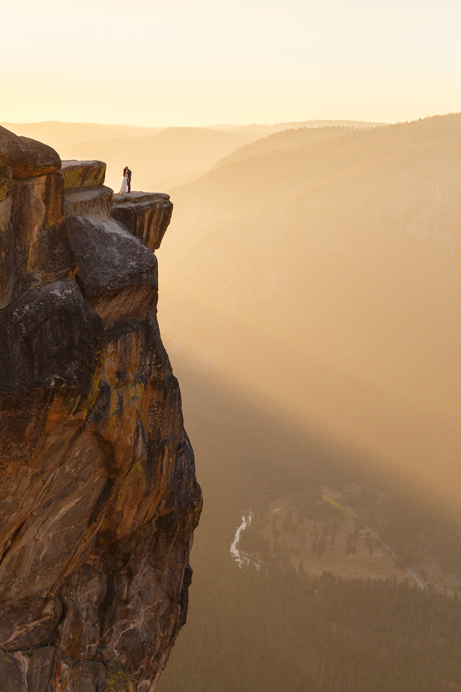 Intimate elopement on the edge of a cliff in Yosemite.