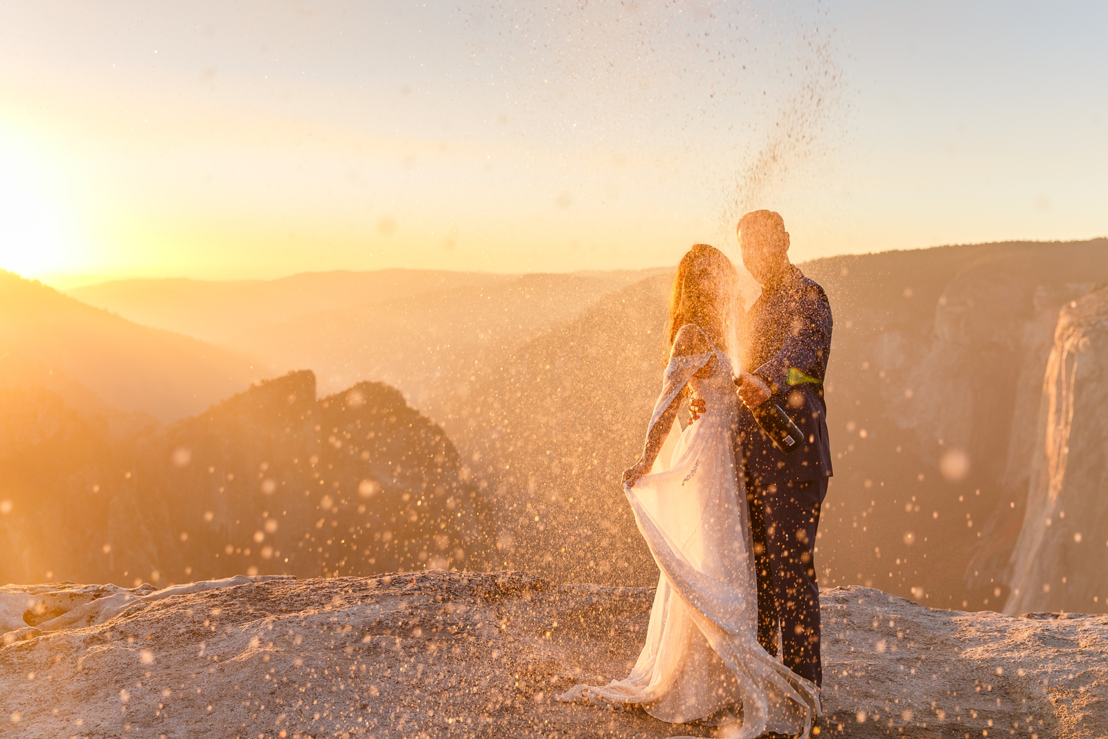 This couple popped some champagne to celebrate at their Taft Point elopement.