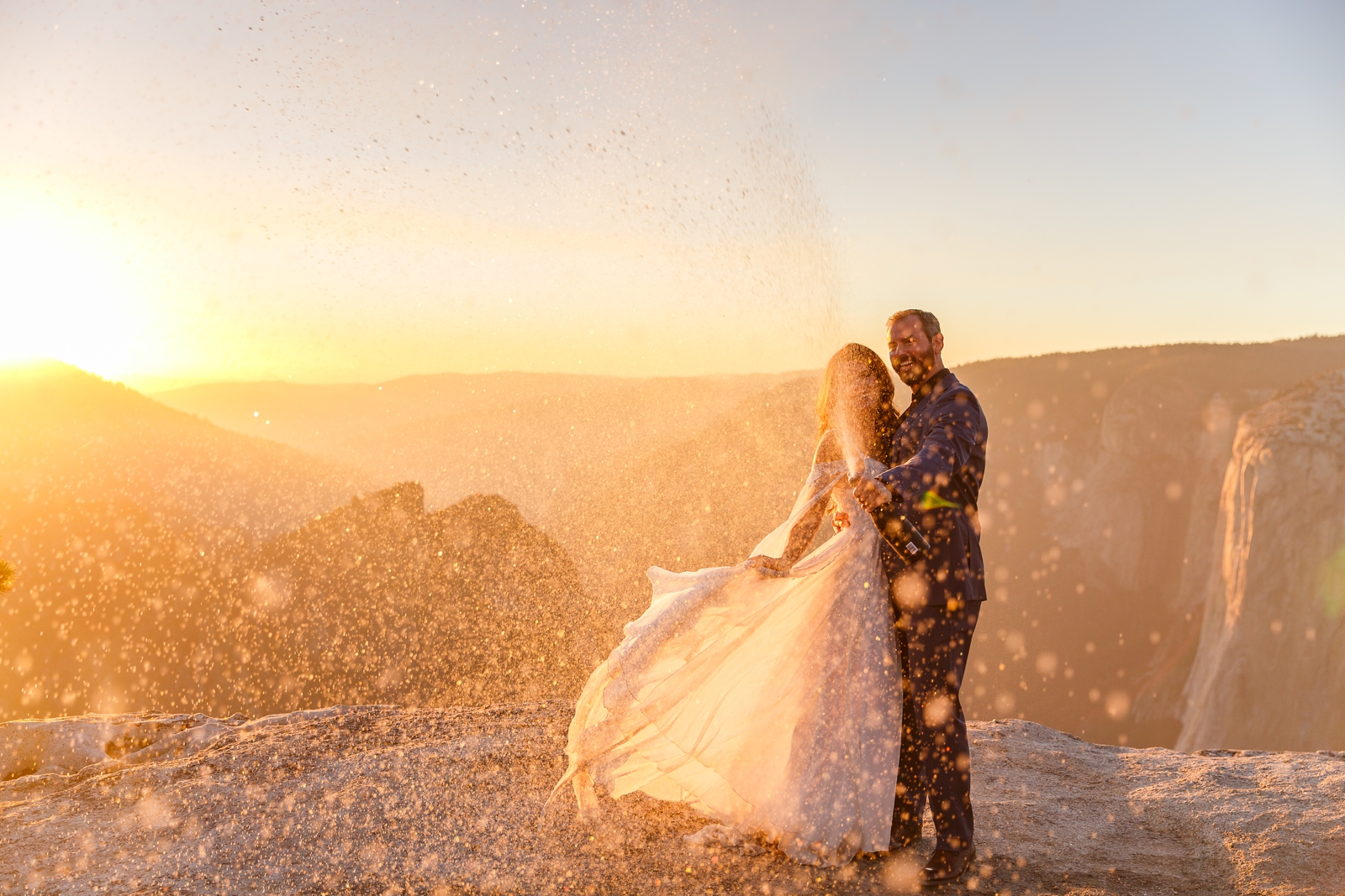 Epic champagne pop at this couple's Taft Point sunset elopement.
