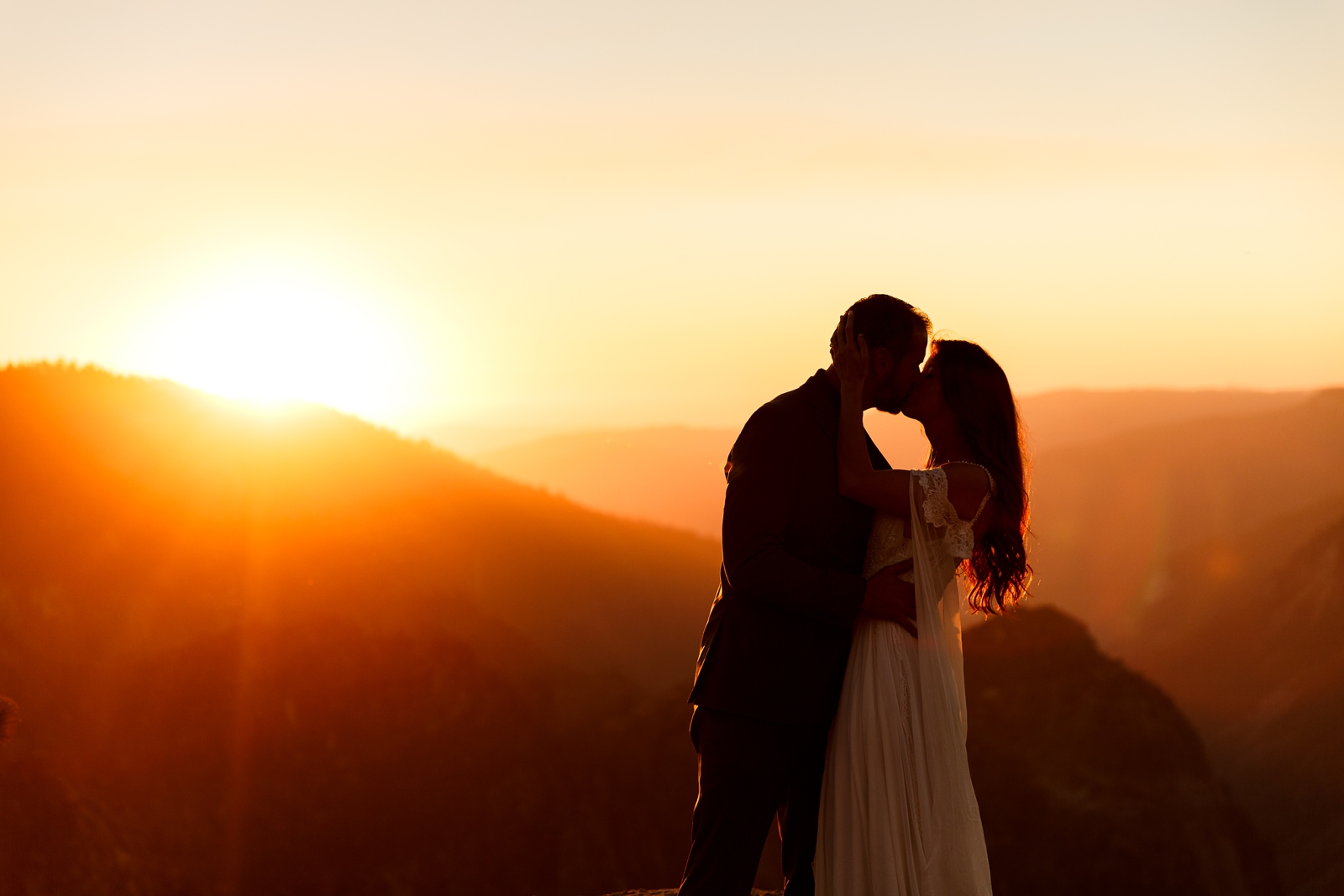 Epic sunset kiss at this couple's Taft Point elopement.