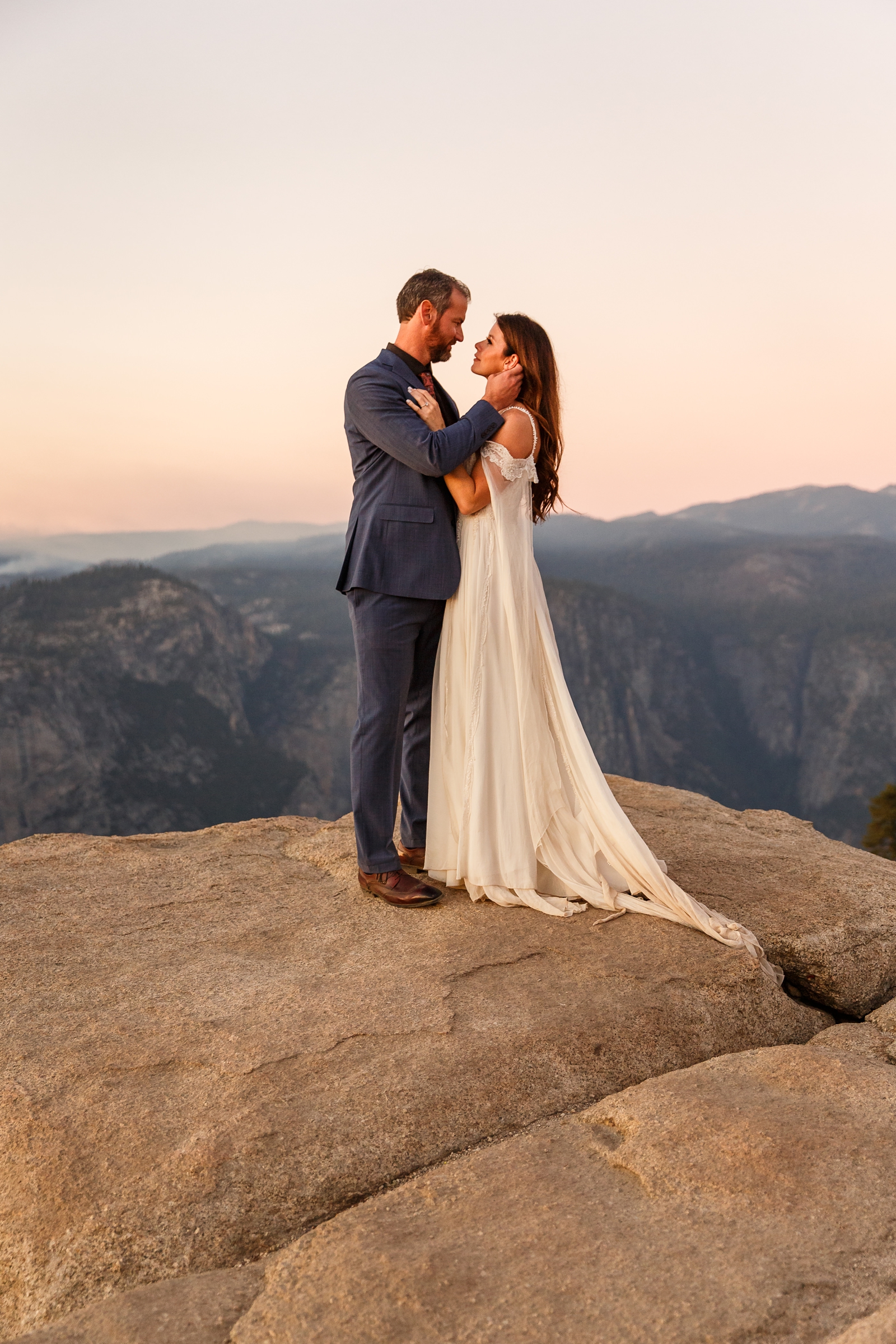 Tender caresses during this couple's Yosemite National Park elopement.
