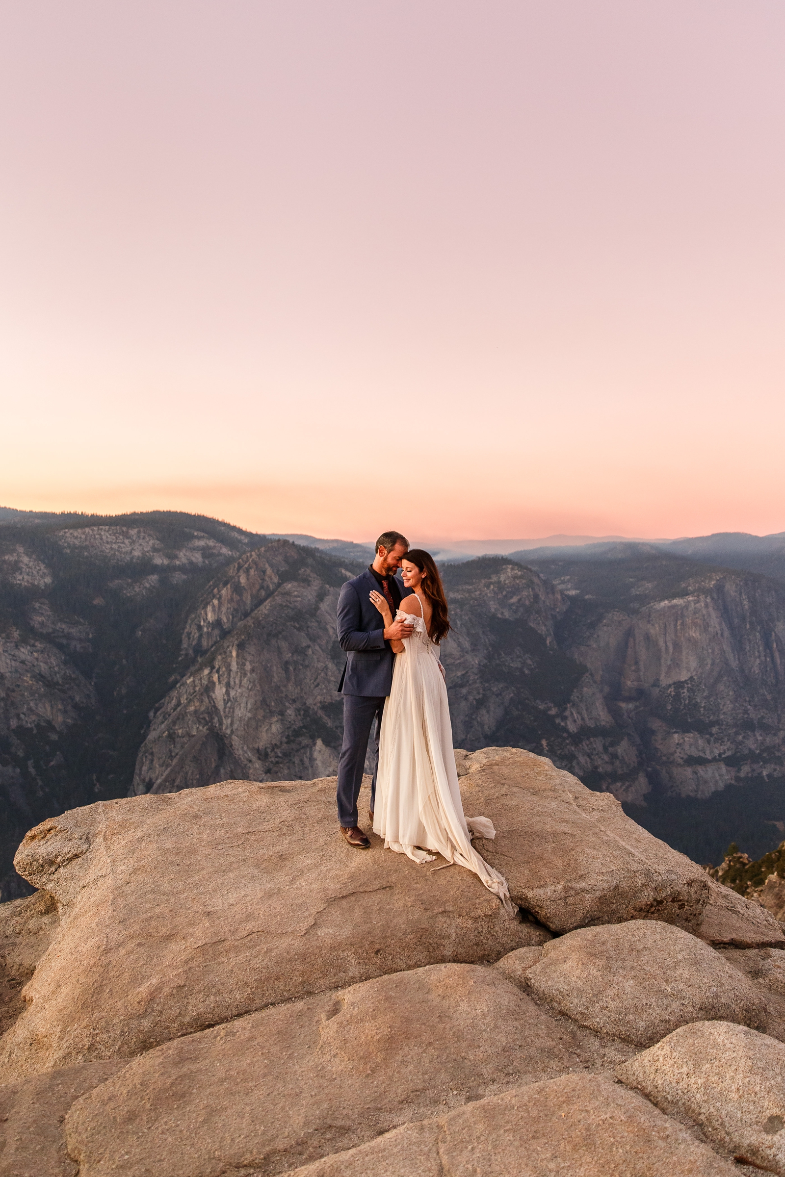 Romantic snuggles at this couple's sunset Yosemite elopement.