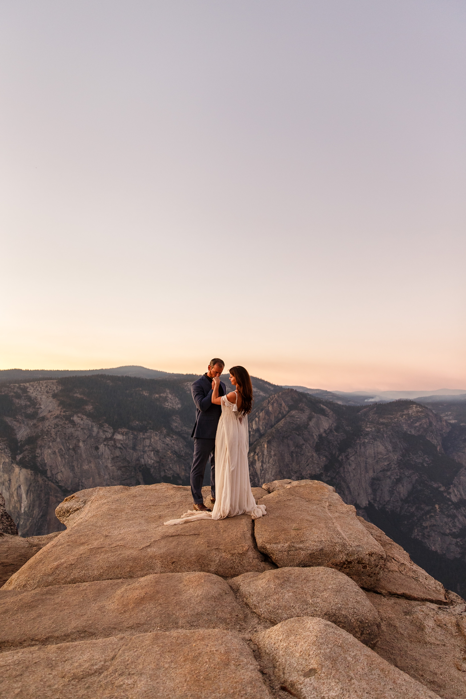Gentle moments at this couple's twilight Taft Point Yosemite elopement