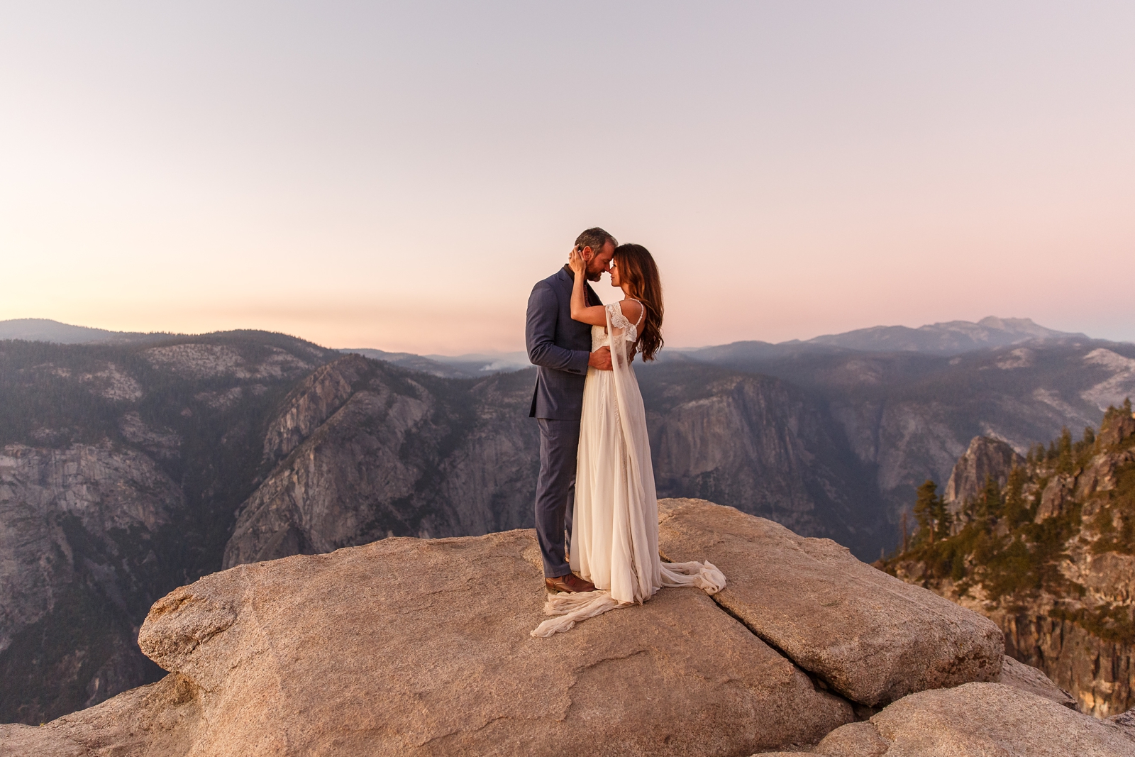 Intimate snuggles at this couple's sunset Yosemite elopement.