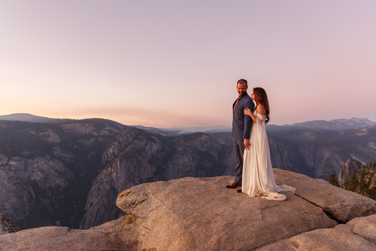 Gorgeous eloping couple at sunset in Yosemite National Park.