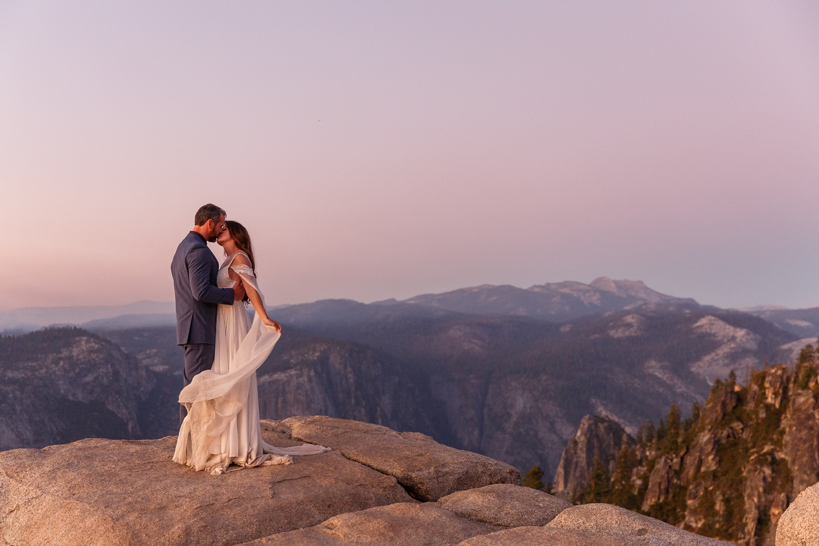 This couple eloped at pink hour at Taft Point in Yosemite National Park.