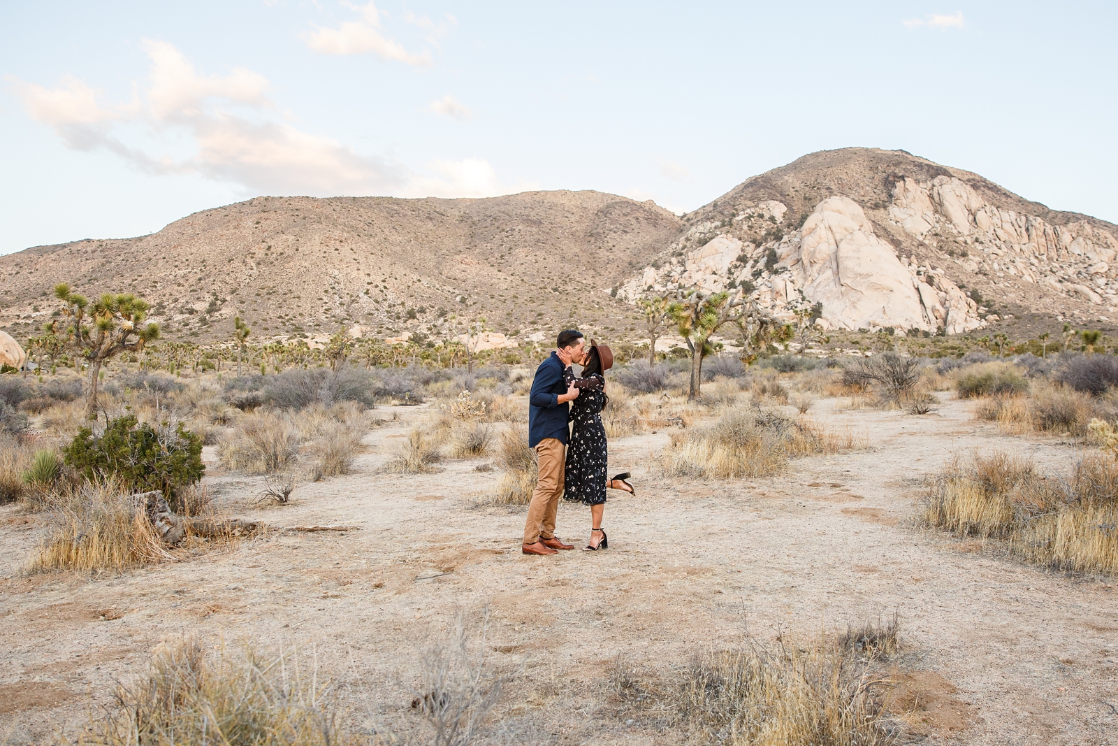 Foot poppin' kiss at this couple's Joshua Tree NP engagement. 