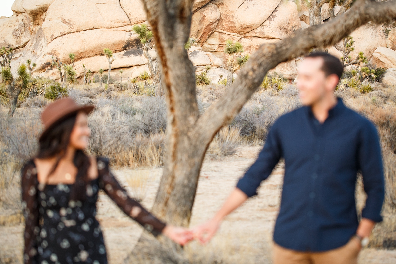 Blurry photo from this couple's intimate Joshua Tree engagement session.
