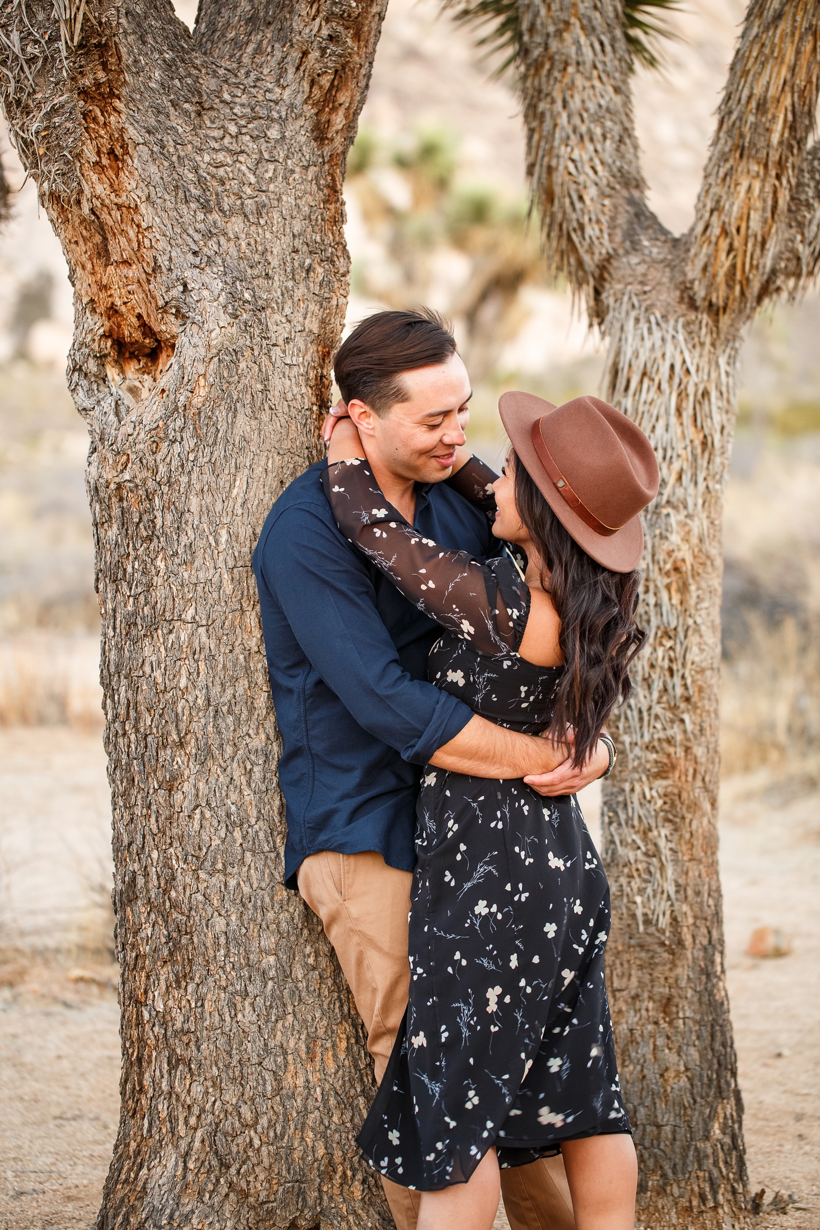 Giggling couple at their Joshua Tree NP engagement session.