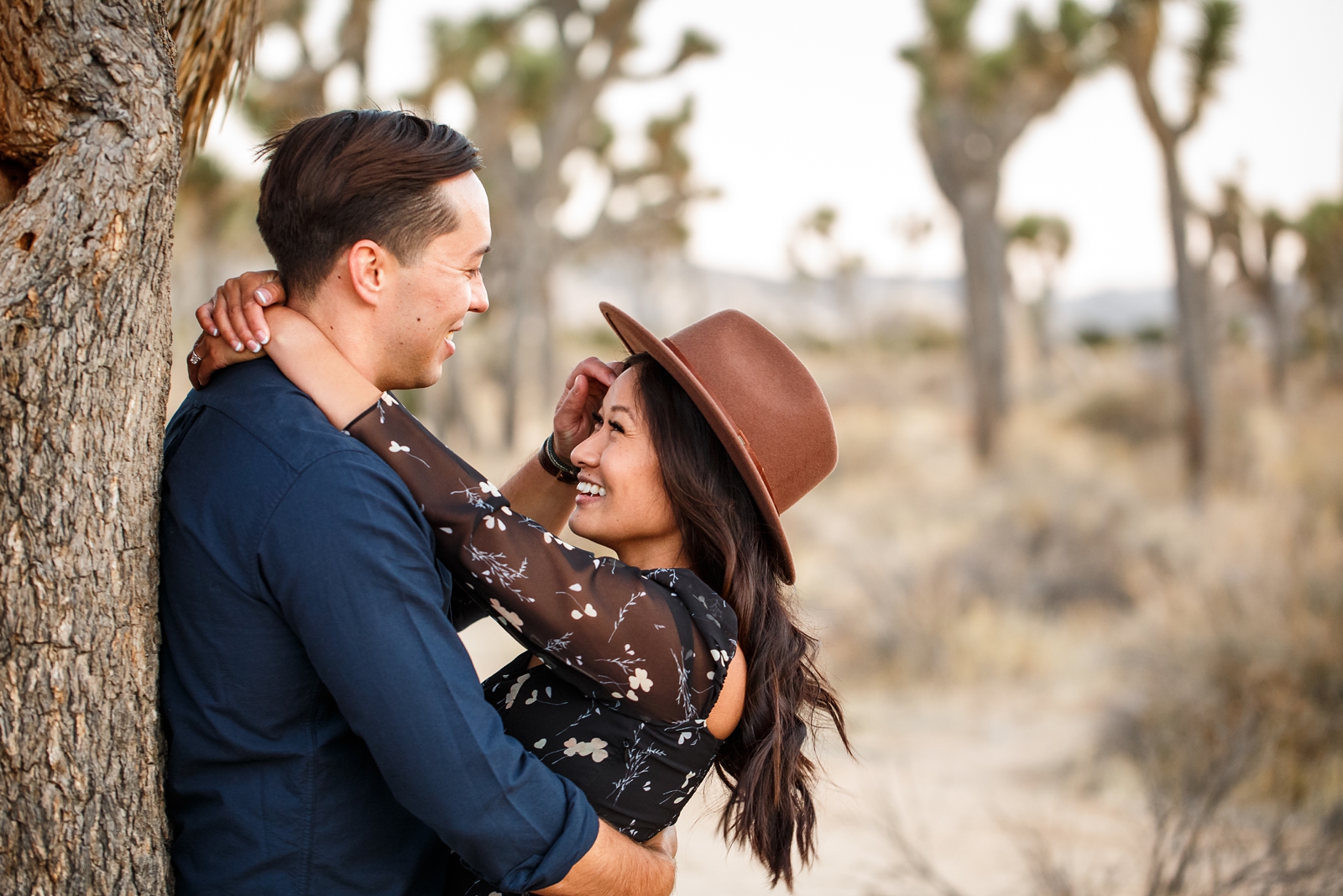 Tender wind swept moments at this couple's Joshua Tree engagement session.