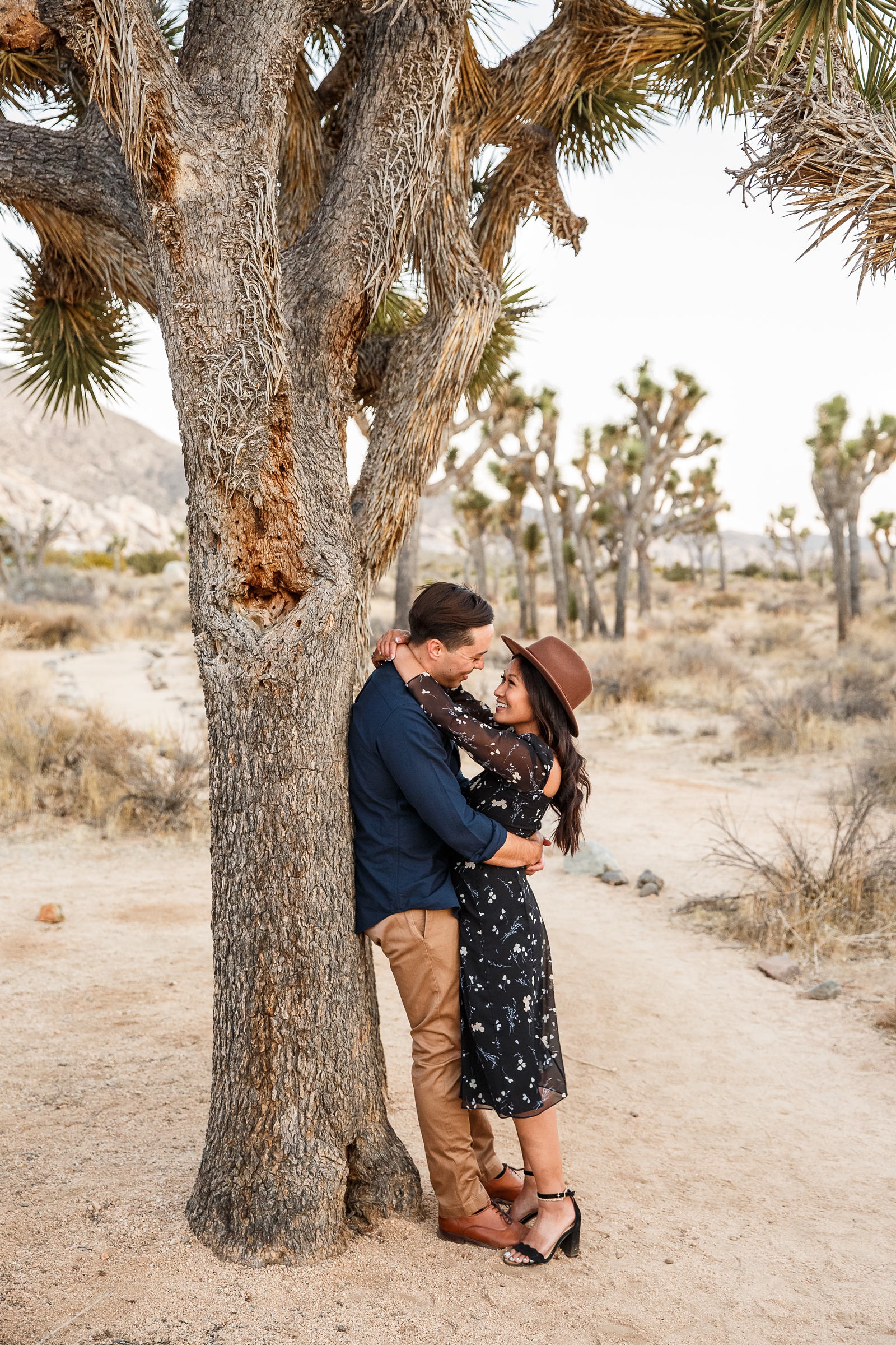 Adorable engaged couple in Joshua Tree National Park.