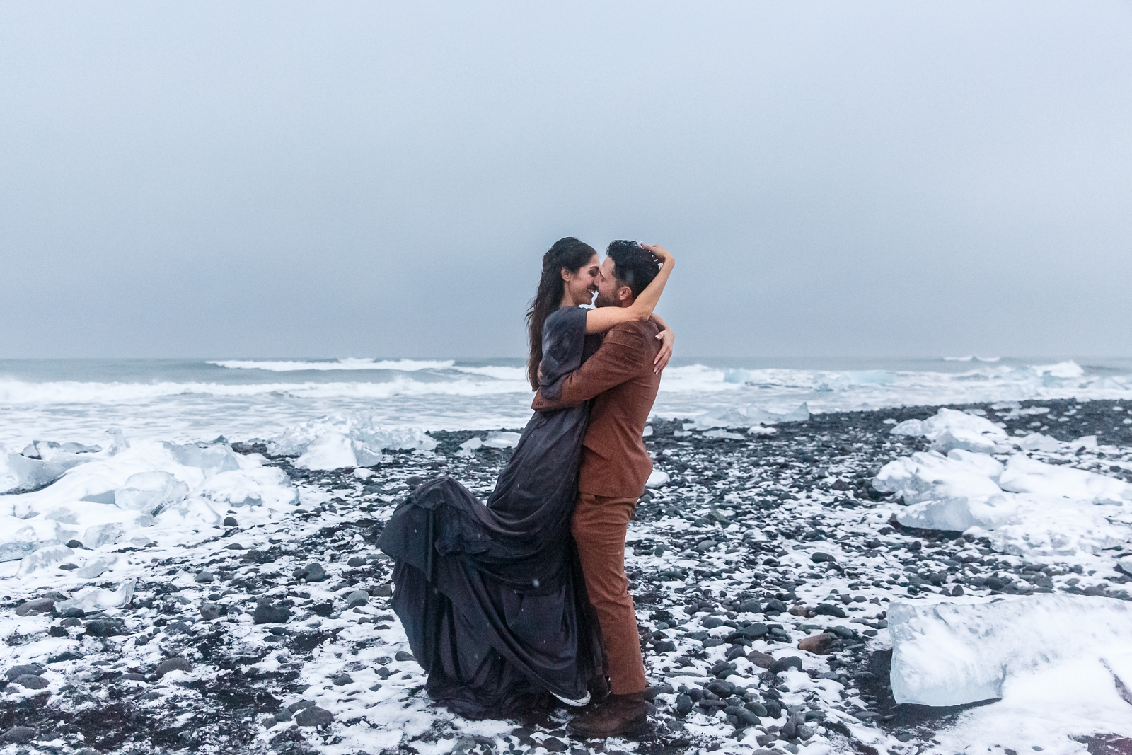 This playful couple just eloped on Diamond Beach in Iceland.