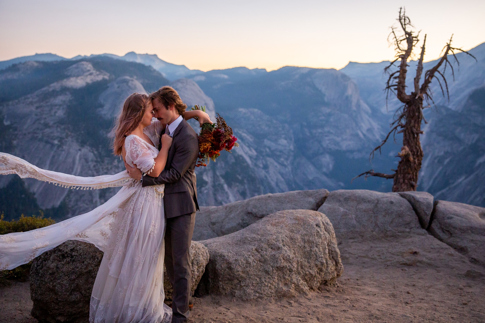 An eloping couple at sunrise in Yosemite.