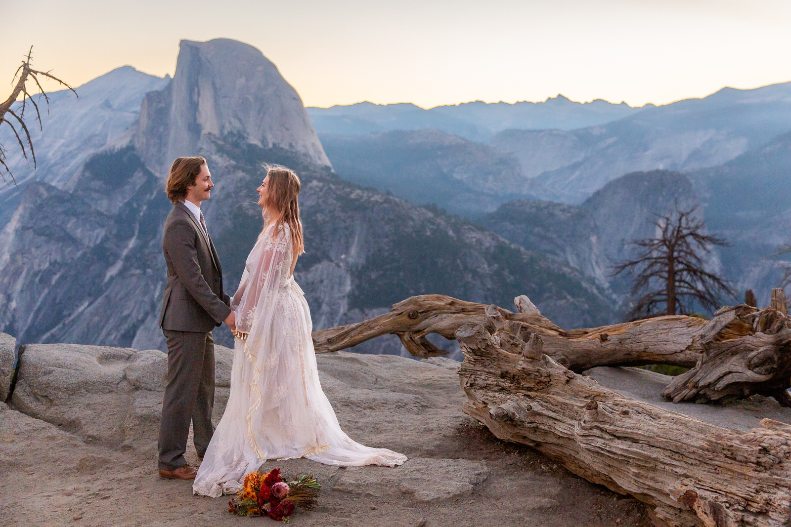 Exchanging vows at this couple's sunrise Glacier Point elopement in Yosemite, CA. 