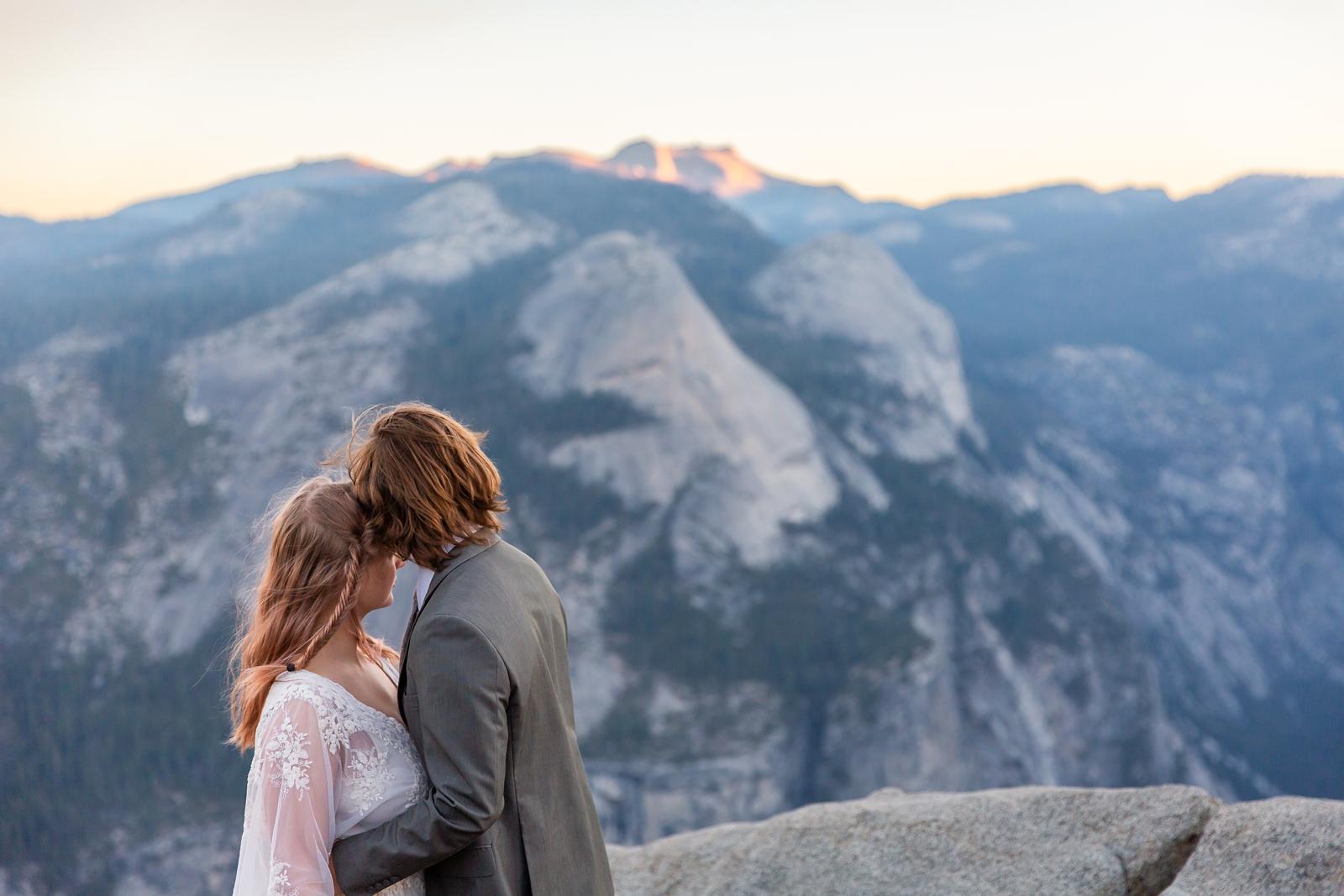 Dreamy eloping couple at Glacier Point Yosemite.
