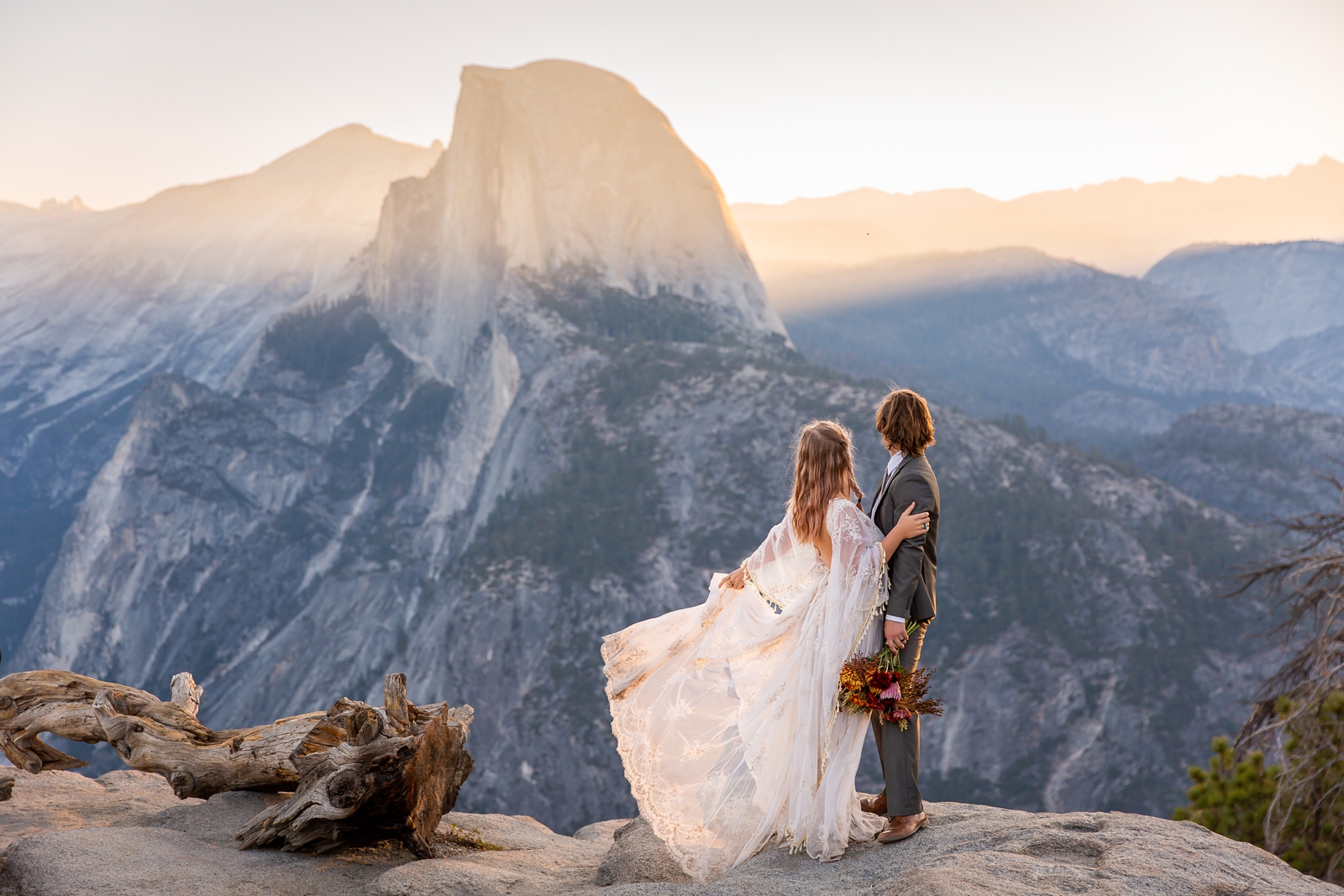 Dreamy sunrise over Half Dome at this couple's Yosemite Glacier Point elopement.