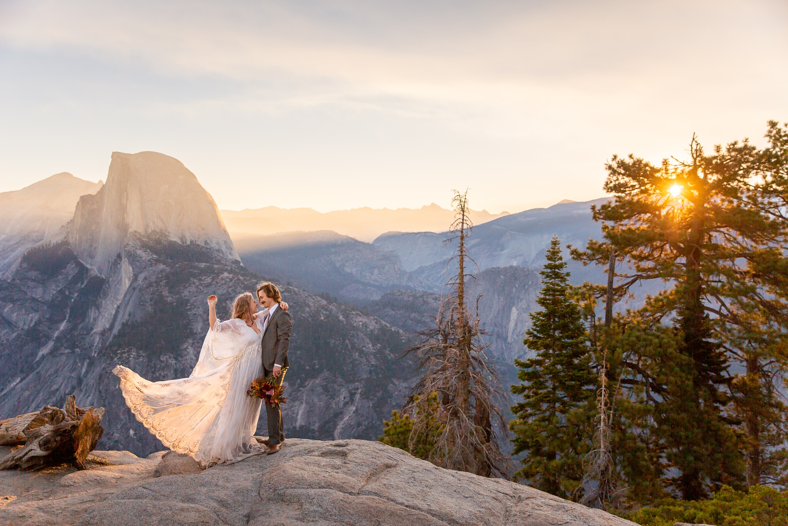 Sun bursts at this bride and groom's Yosemite Glacier Point elopement.