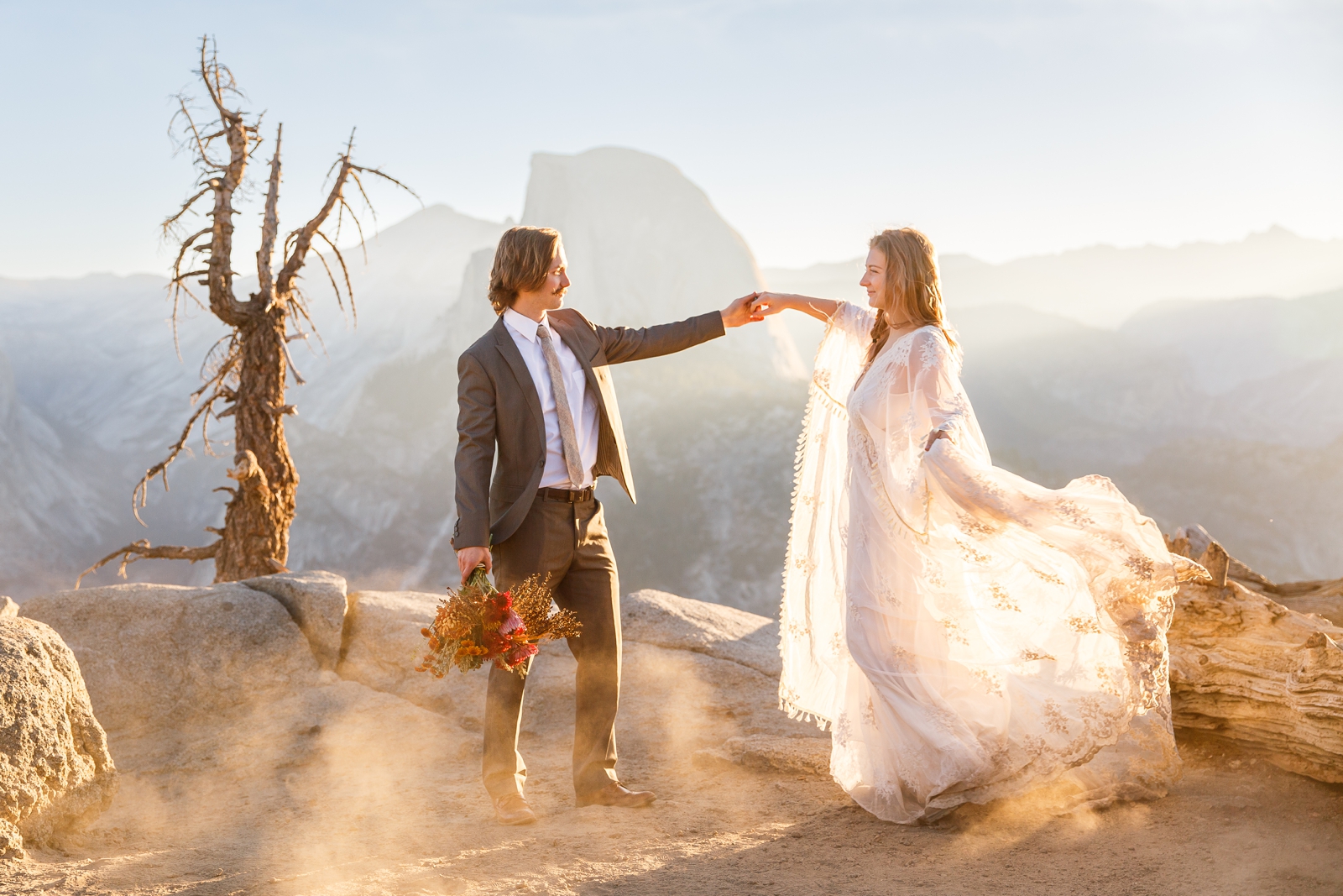 Dreamy sunrise light at this couple's Half Dome Yosemite Glacier Point elopement