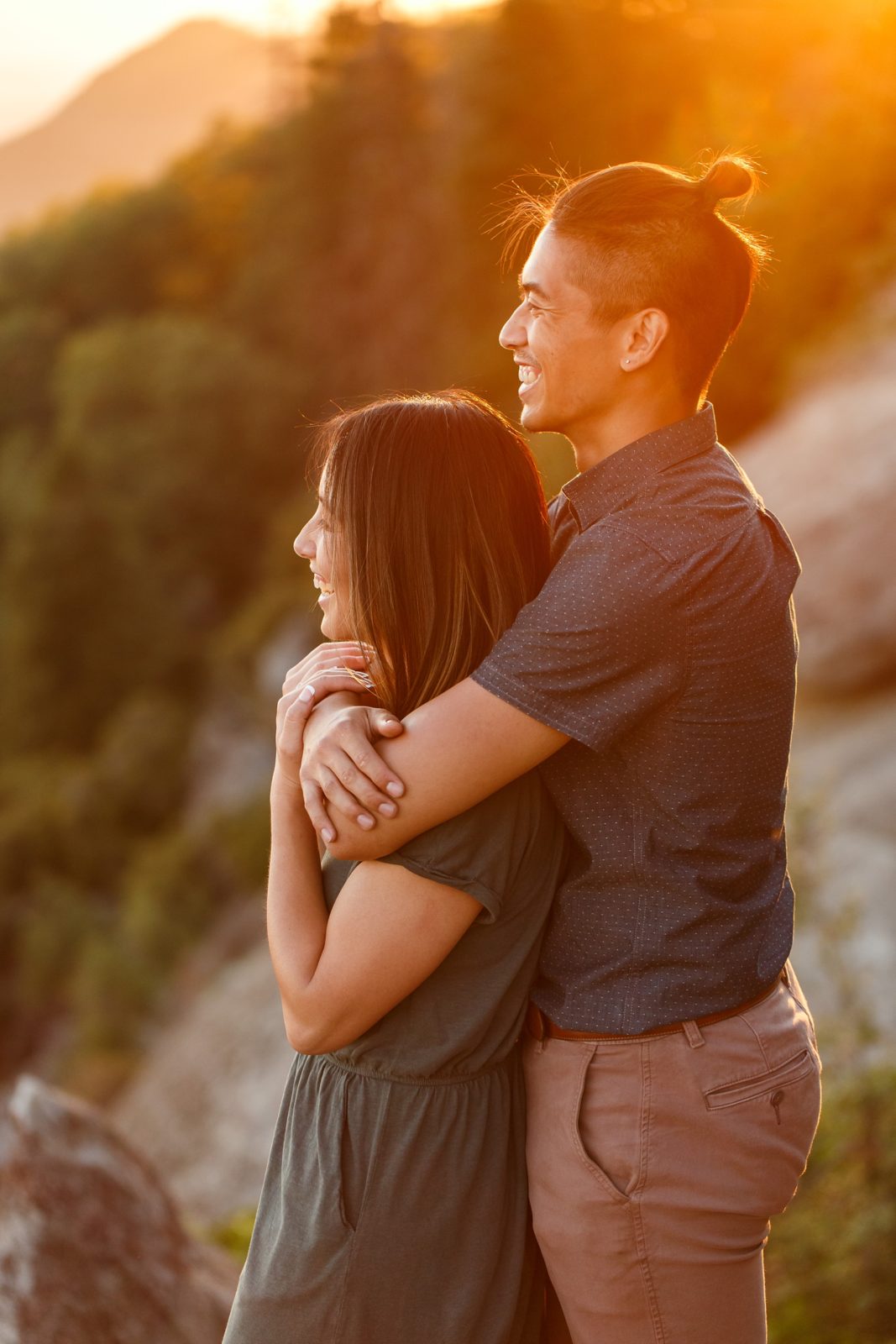 Hugging couple at their Sequoia National Park engagement Session. 