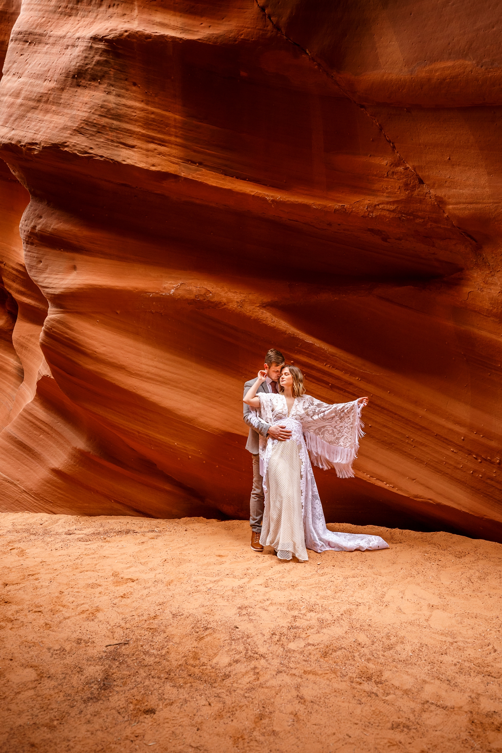 This fun boho in-love couple traveled to Page Arizona for their adventurous slot canyon elopement at Waterholes Canyon near Horseshoe Bend